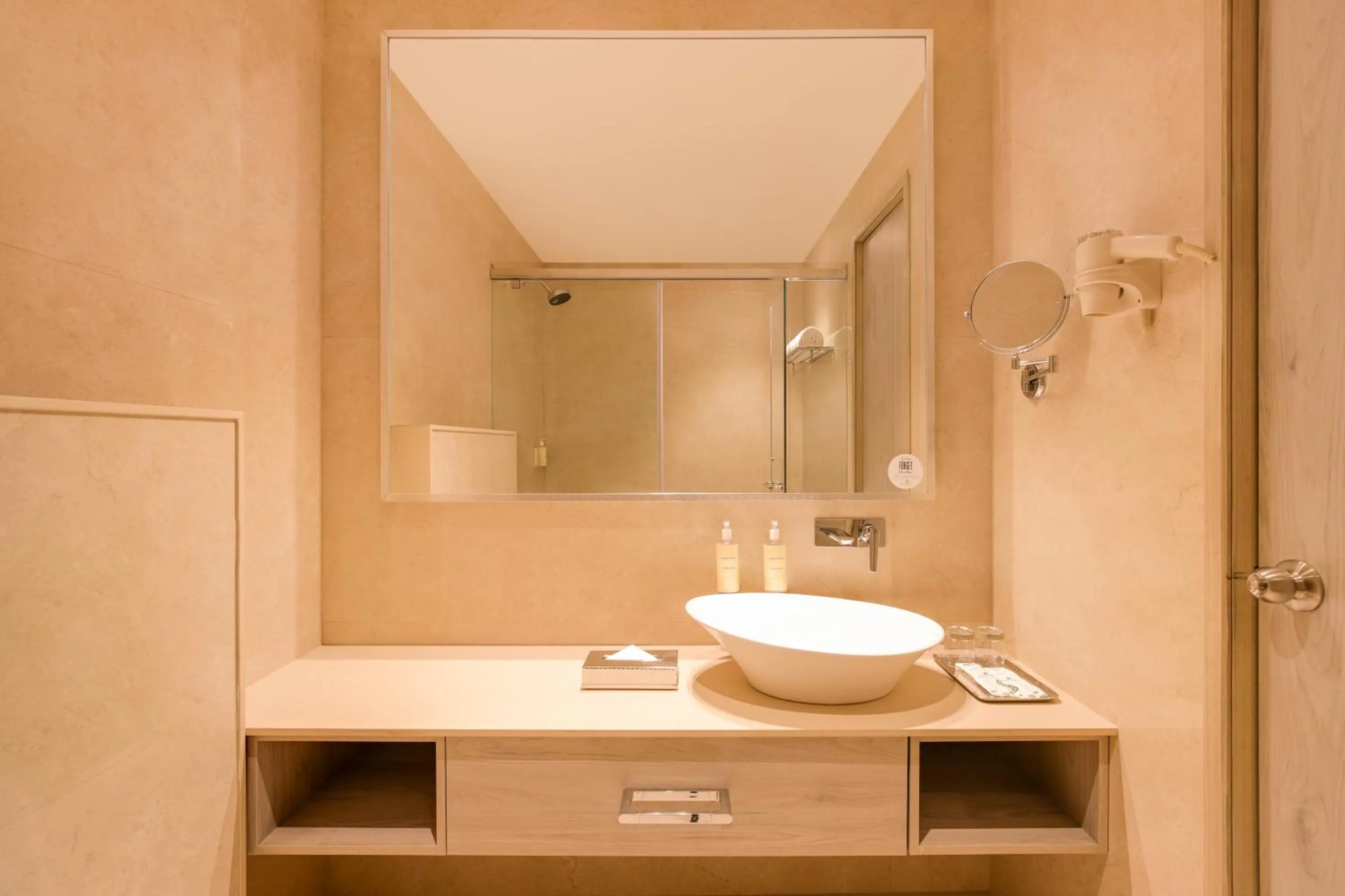 Bathroom in Lemon Tree Hotel, Jamnagar