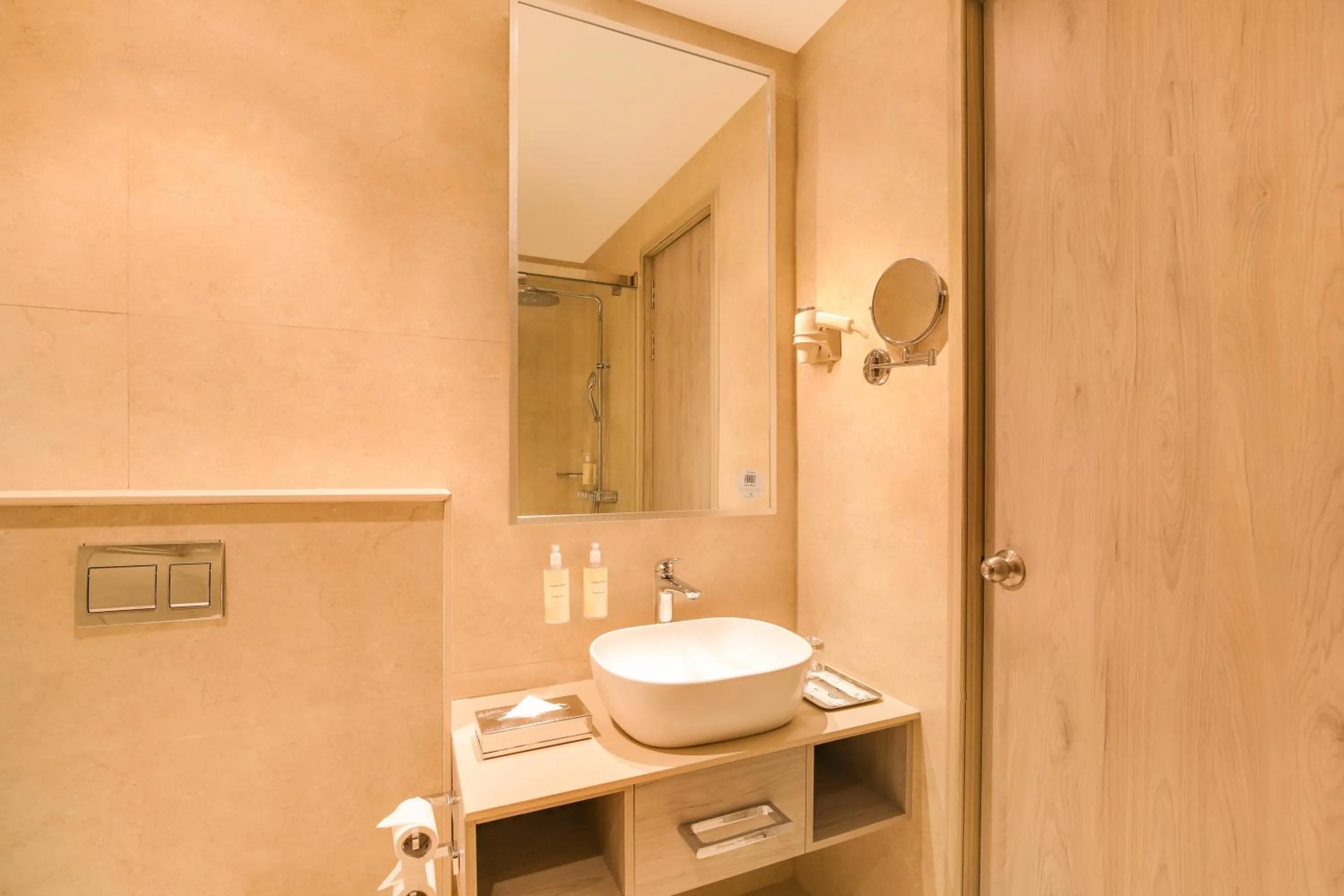 Bathroom in Lemon Tree Hotel, Jamnagar