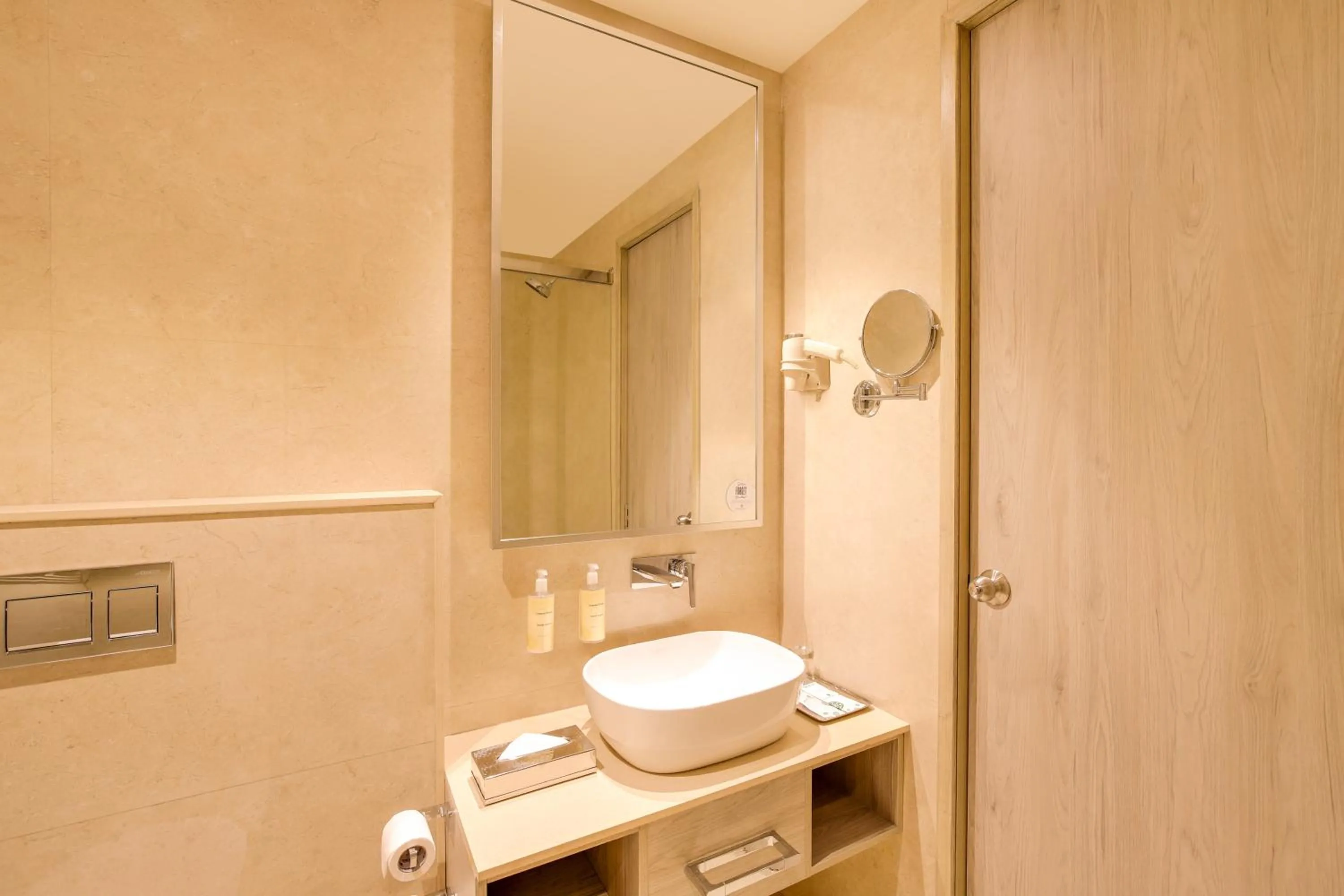 Bathroom in Lemon Tree Hotel, Jamnagar
