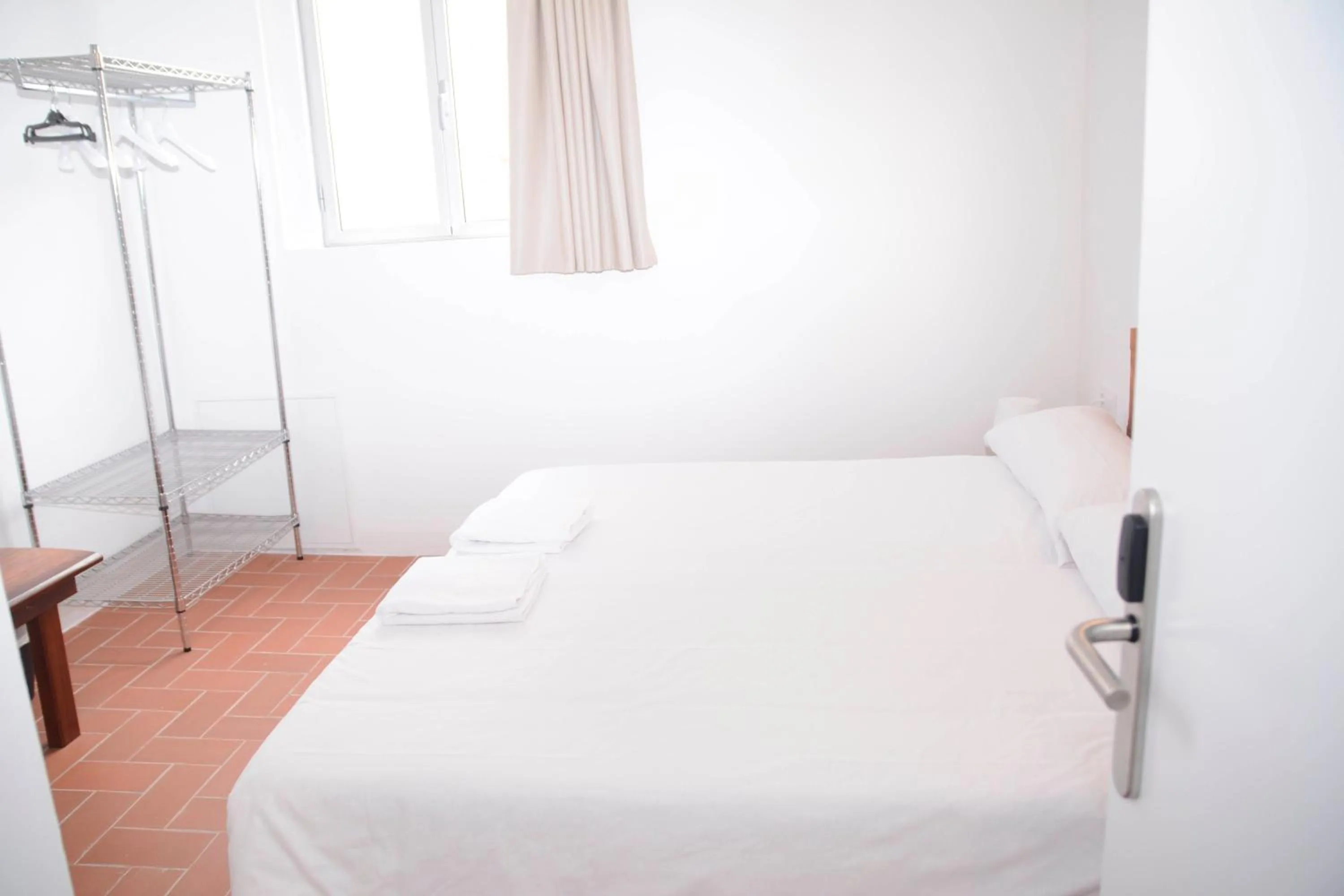 Photo of the whole room, Bed in Pigal