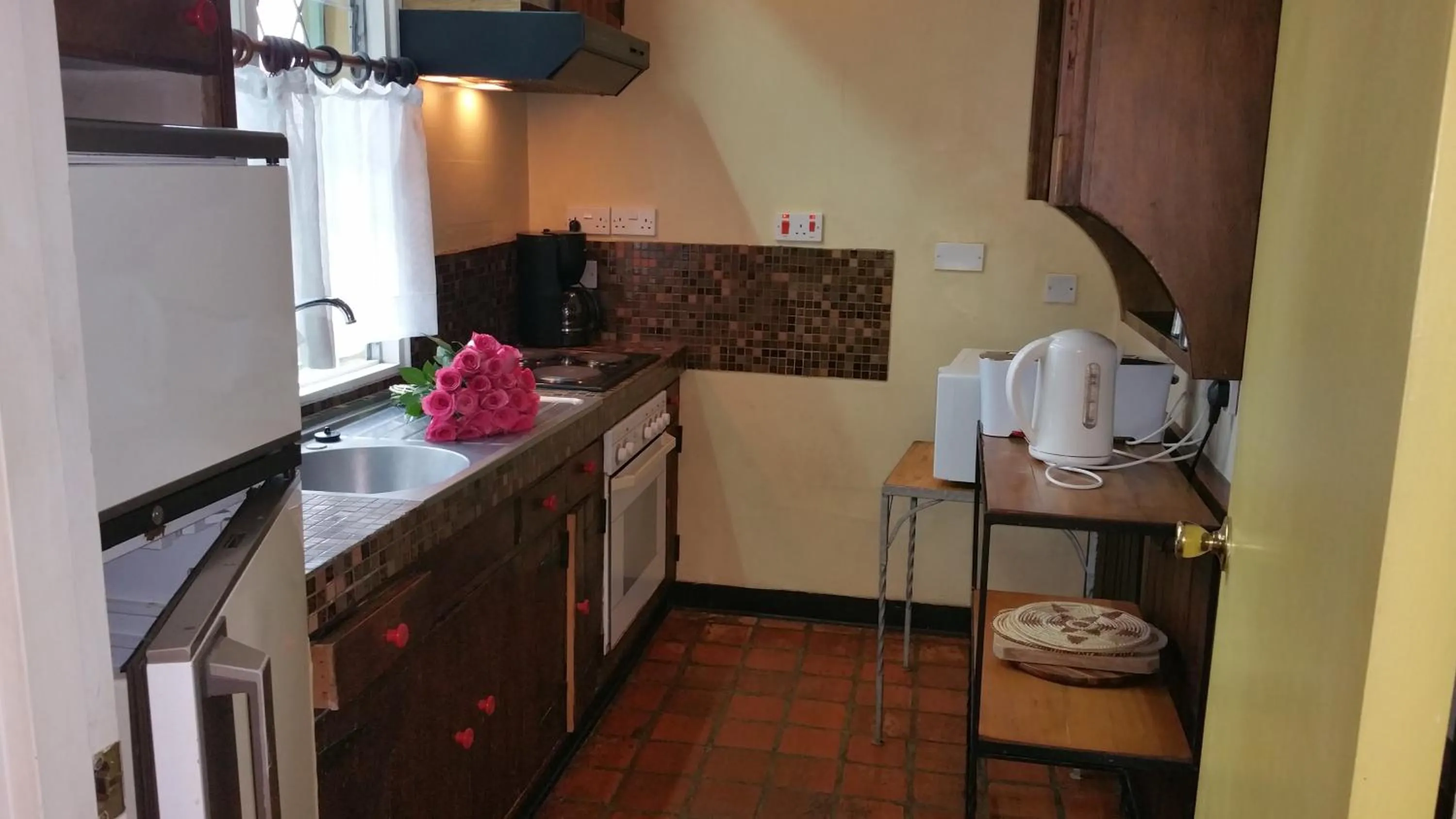 Kitchen or kitchenette in Woodmere Grand Hotel & Serviced Apartments