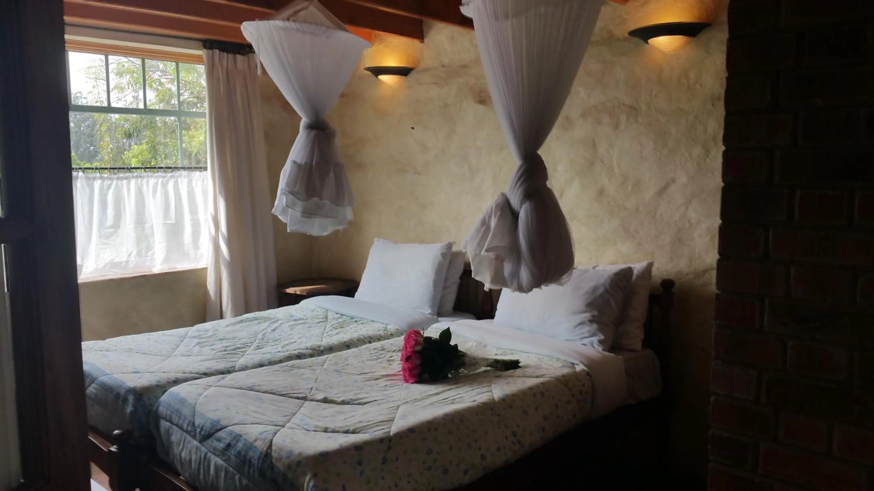 Bed in Woodmere Grand Hotel & Serviced Apartments