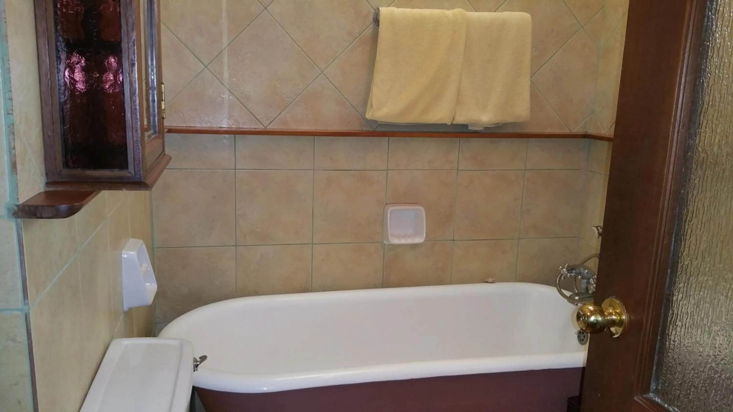 Bathroom in Woodmere Grand Hotel & Serviced Apartments