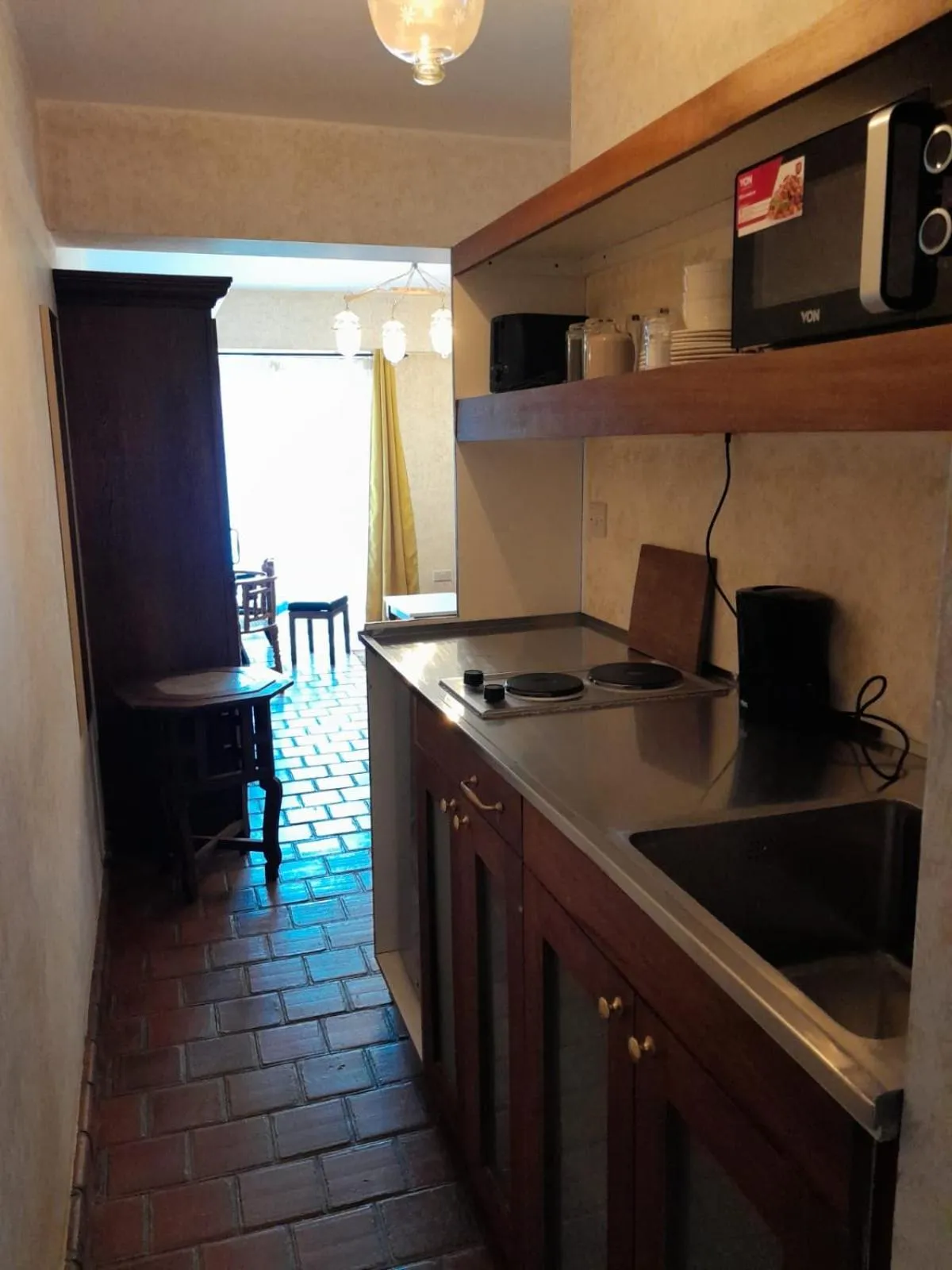 Kitchen or kitchenette in Woodmere Grand Hotel & Serviced Apartments