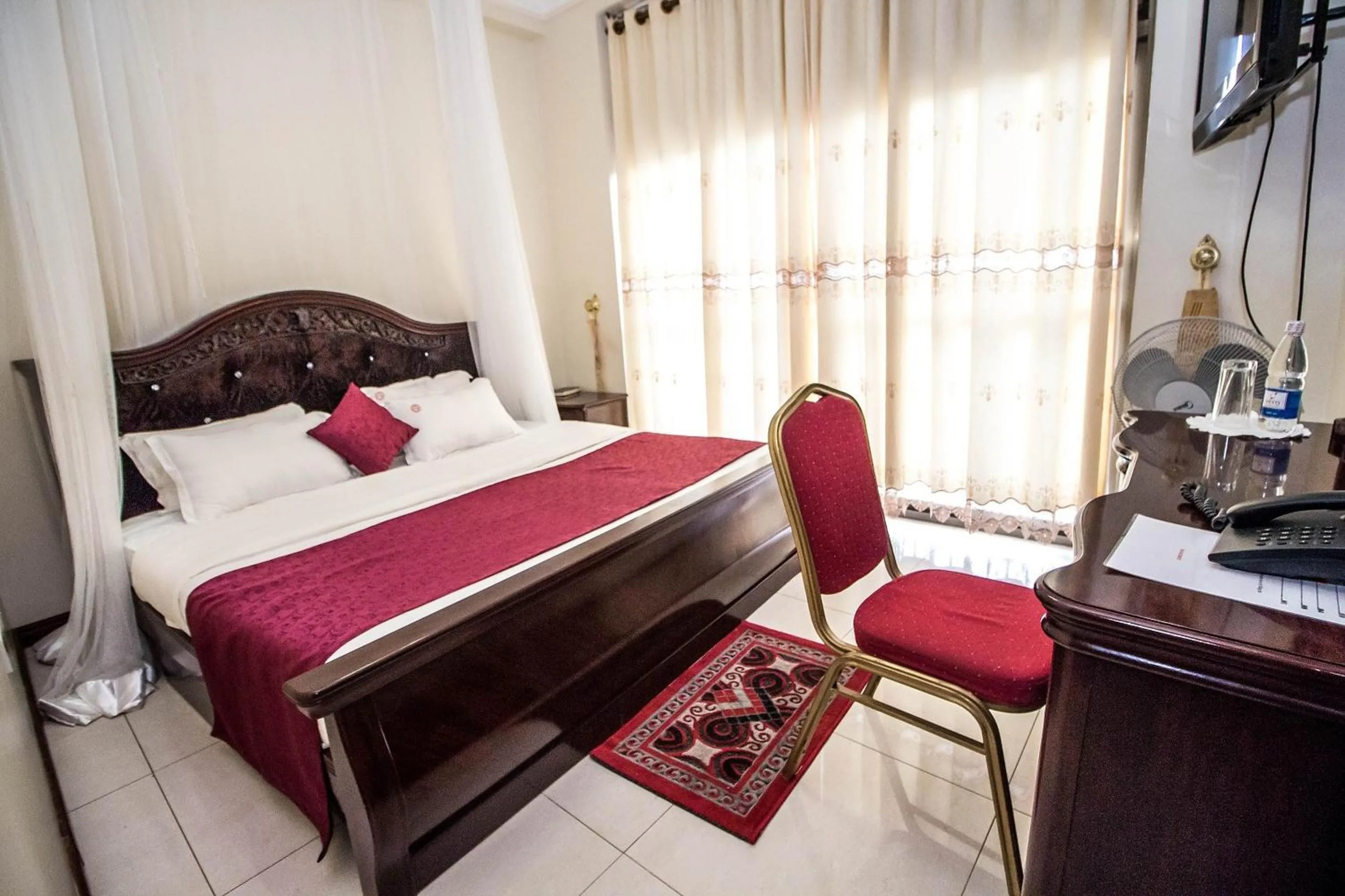 Bed in Sir Jose Hotel