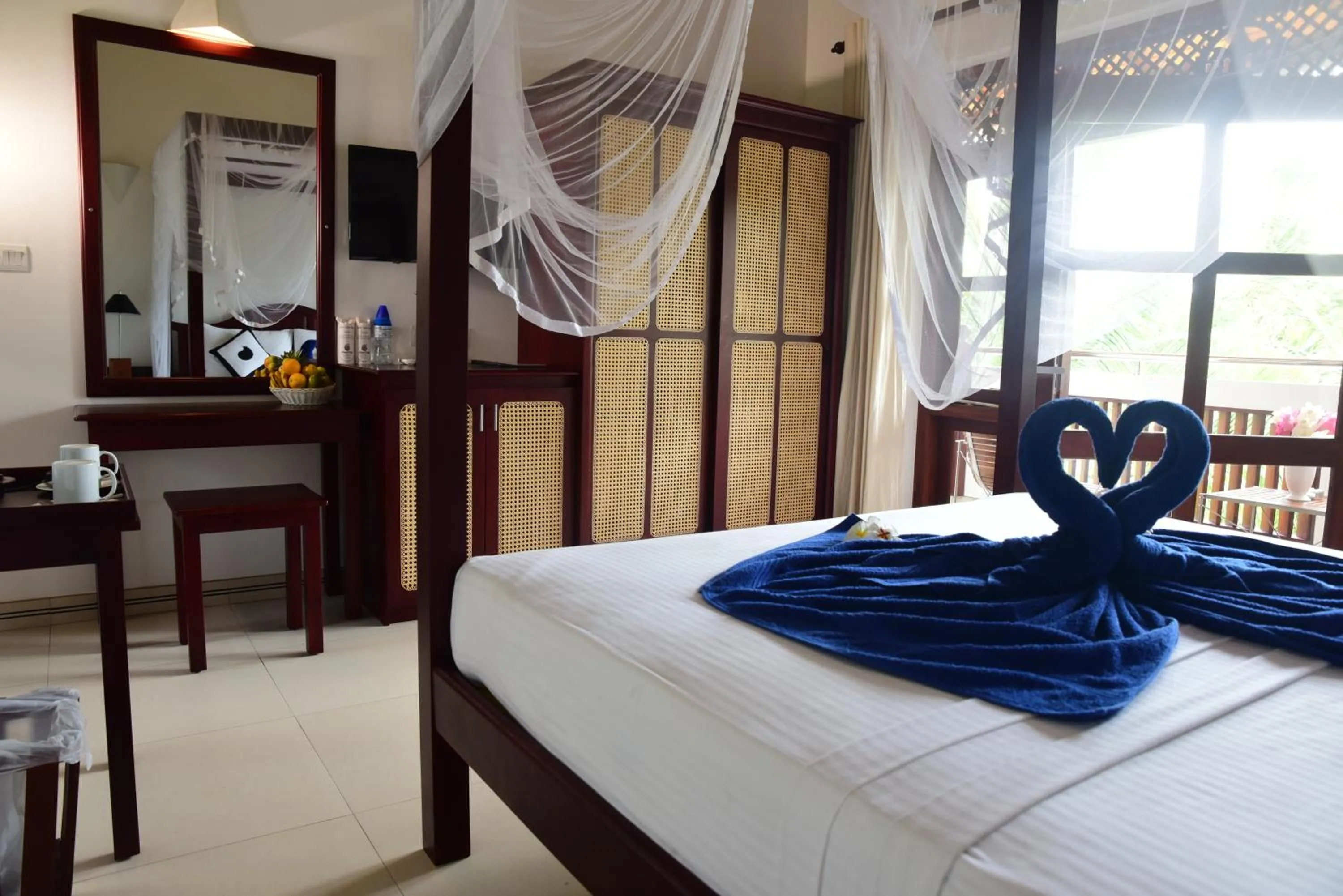 Living room, Bed in Amal Beach Hotel