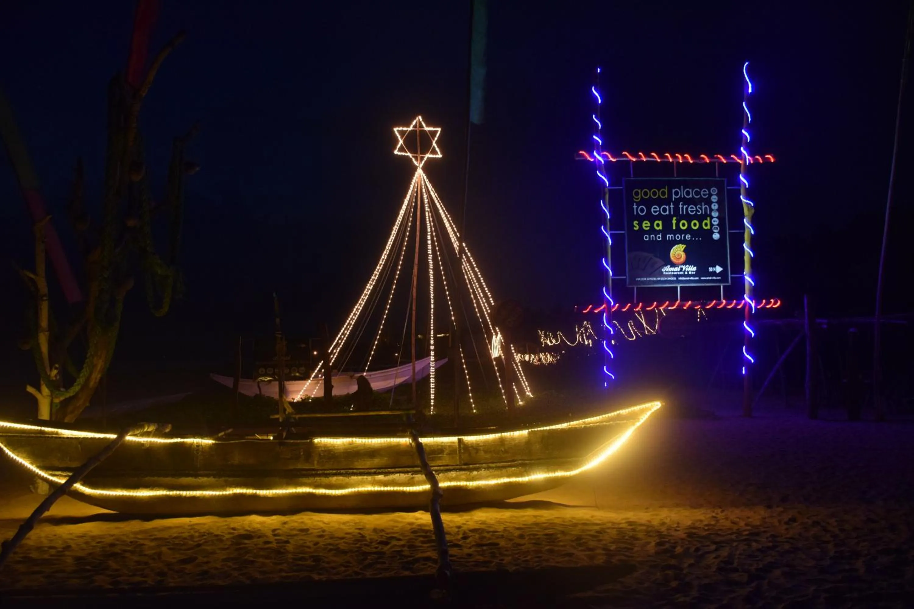 Property logo or sign in Amal Beach Hotel