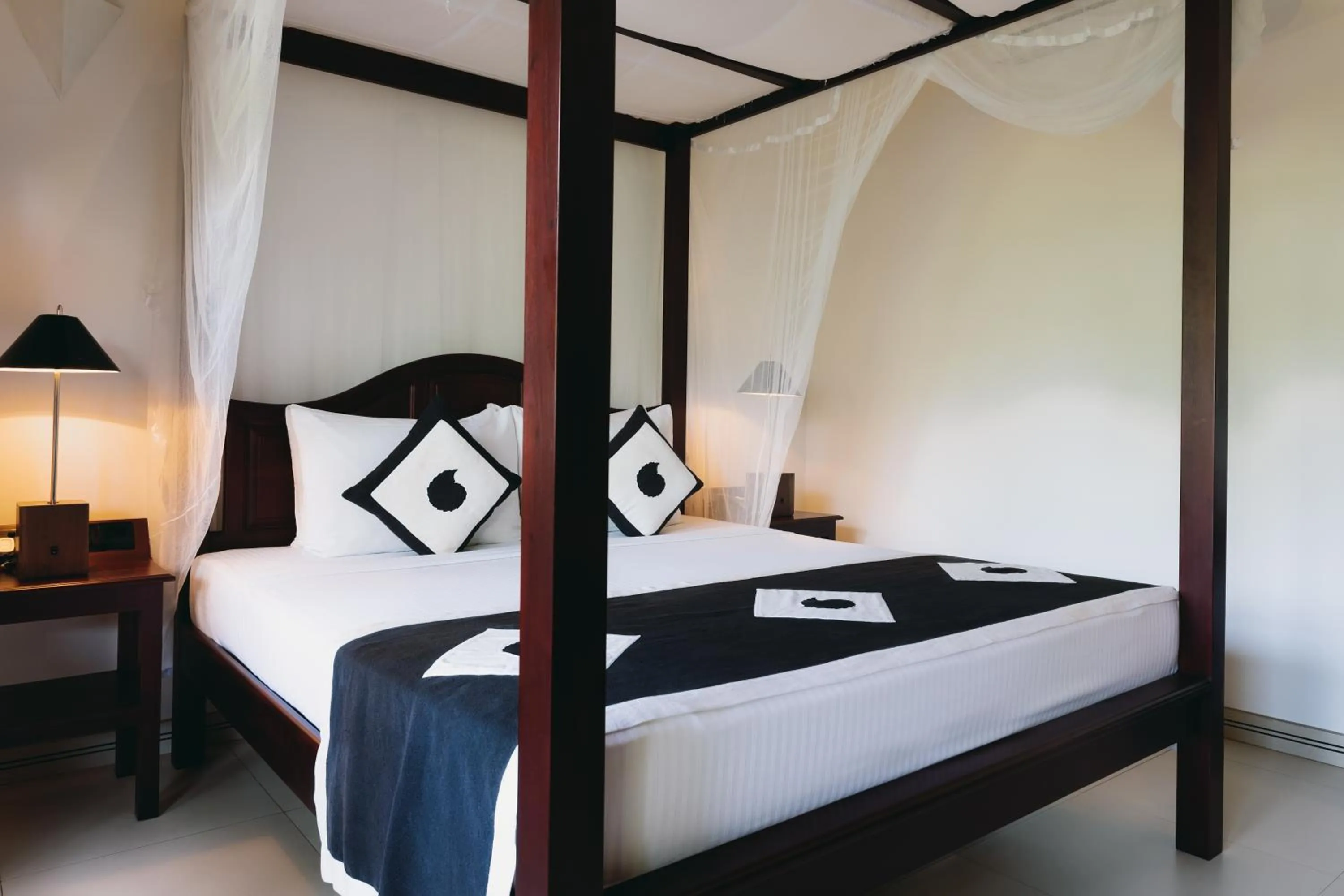 Bed in Amal Beach Hotel