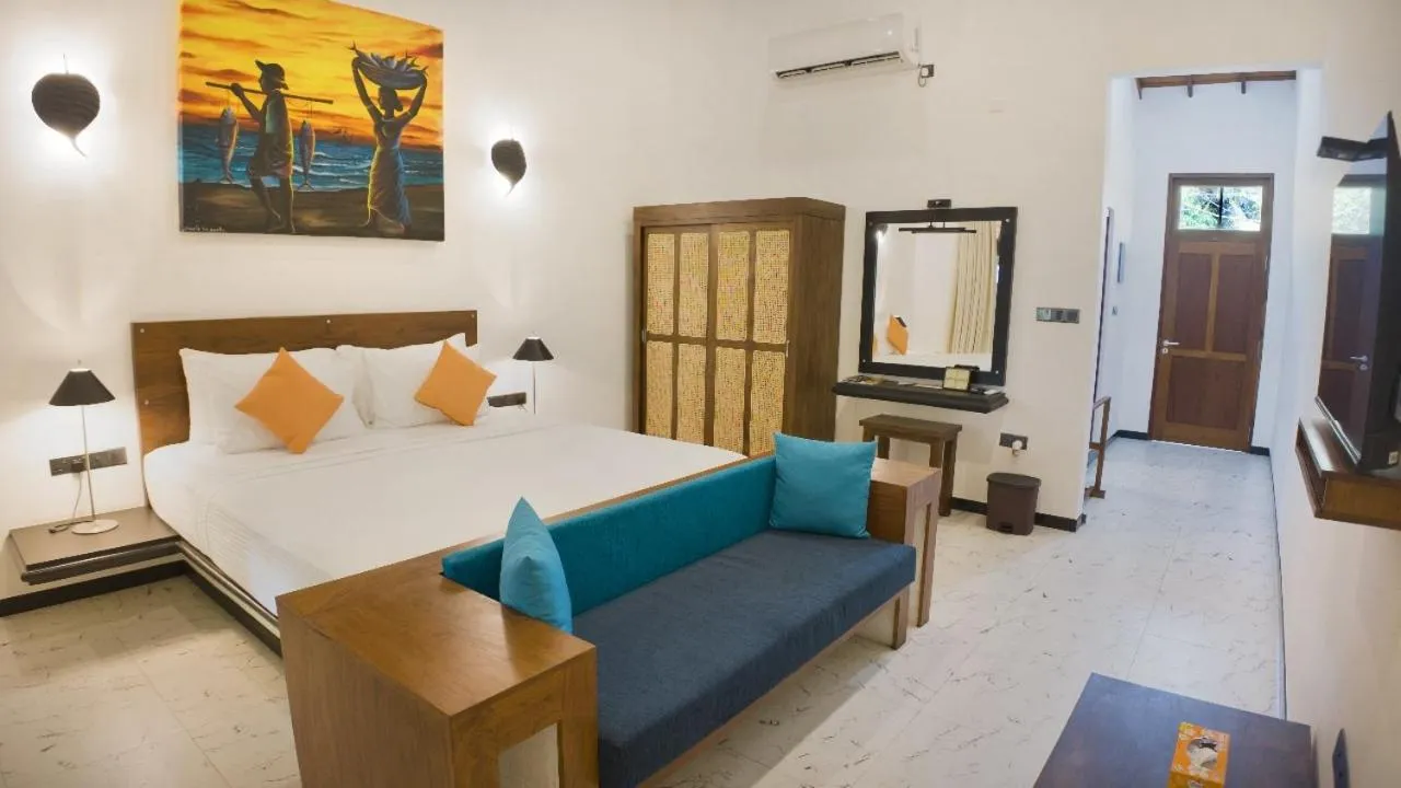 Bed in Amal Beach Hotel