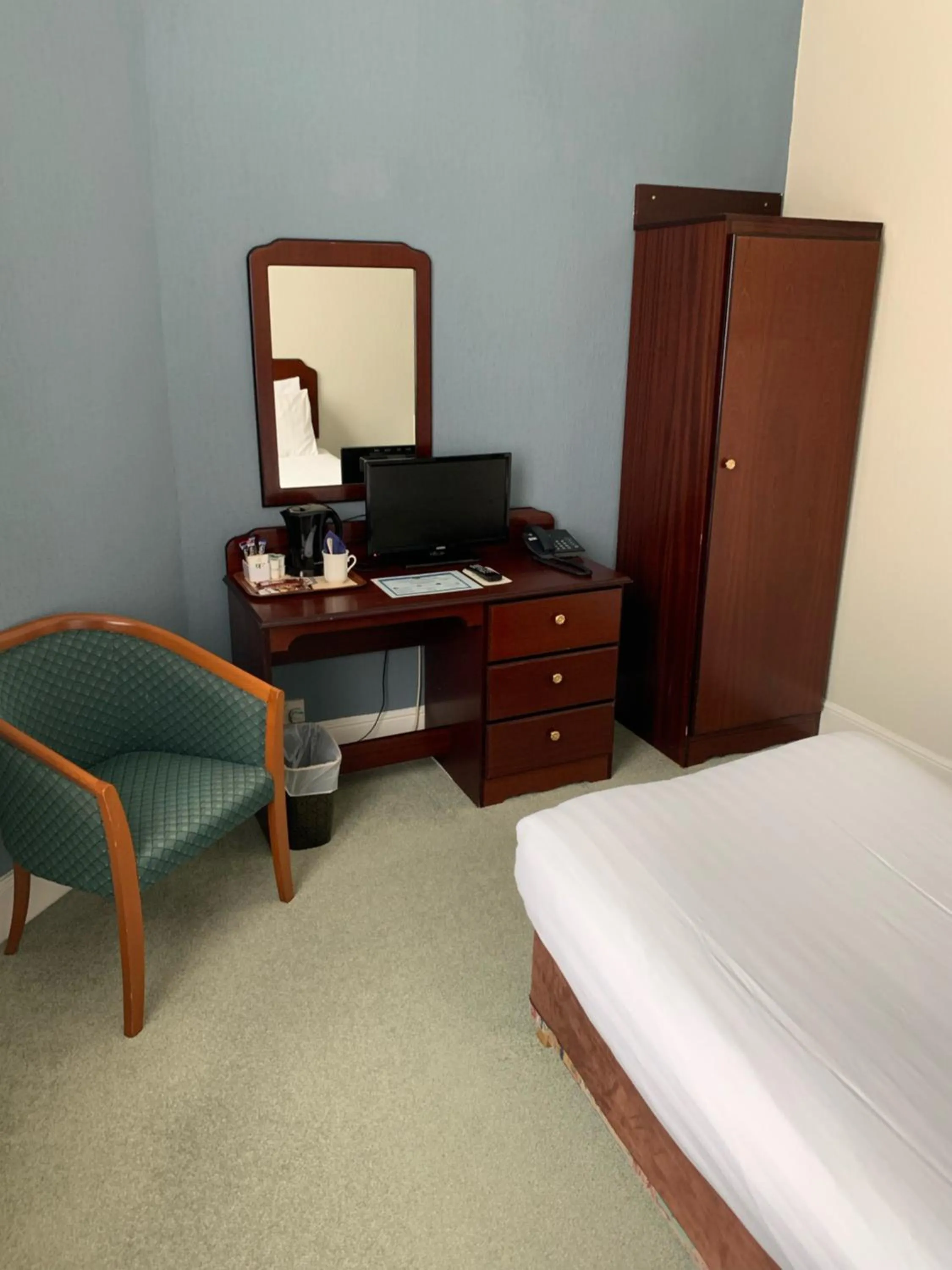 Bed in Royal Esplanade Hotel