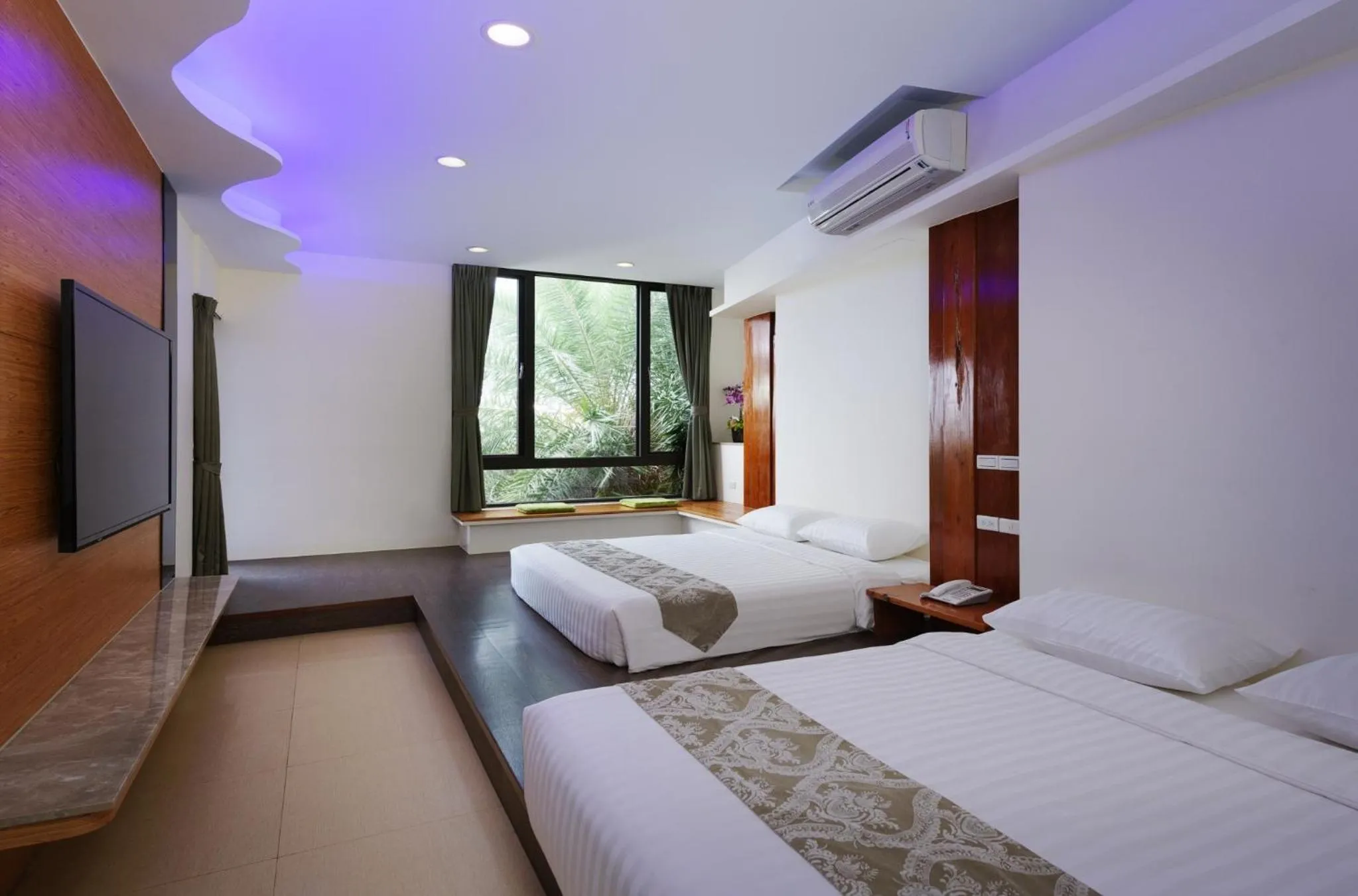 Bed in Oceanic Pearl Resort