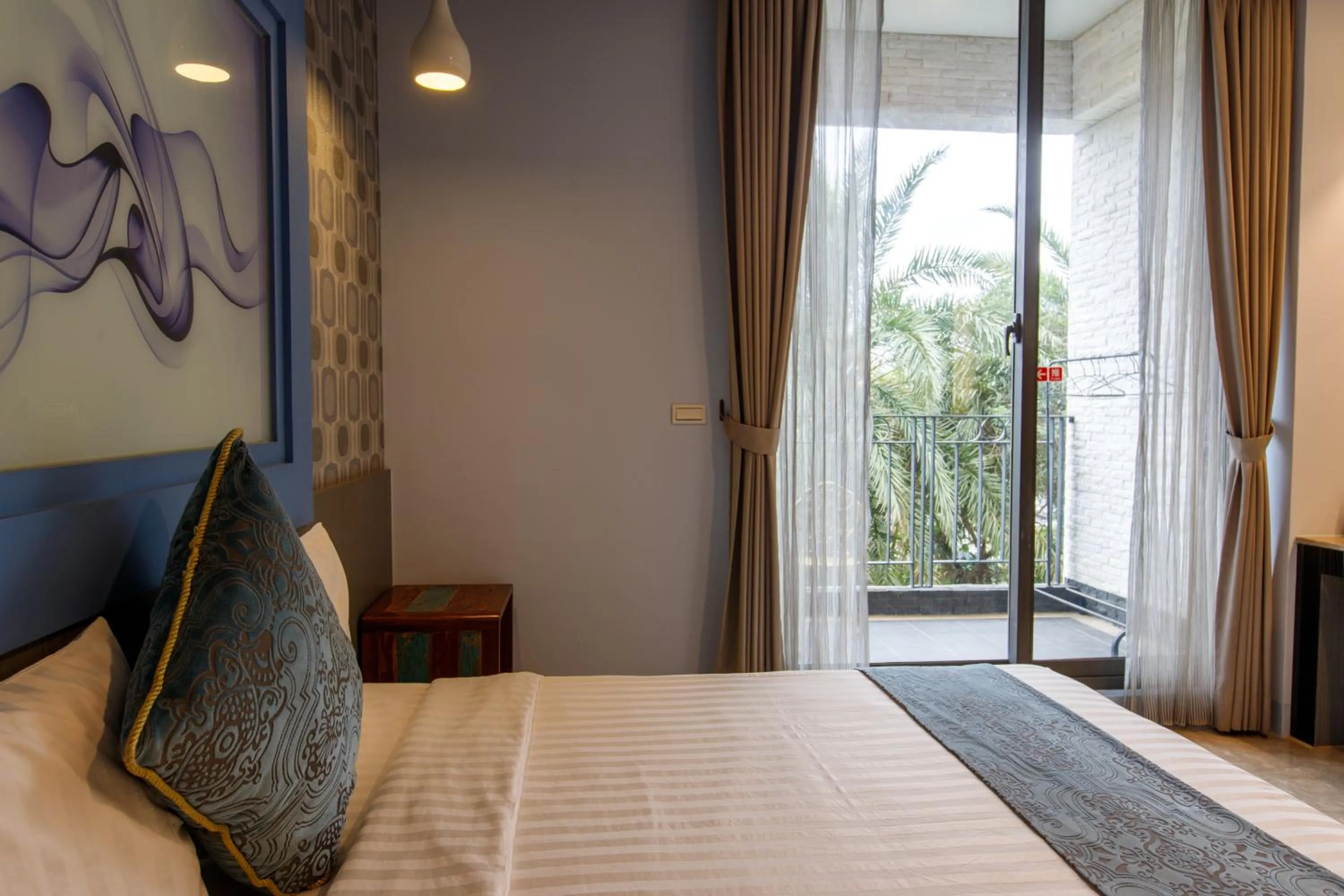 Bed in Oceanic Pearl Resort