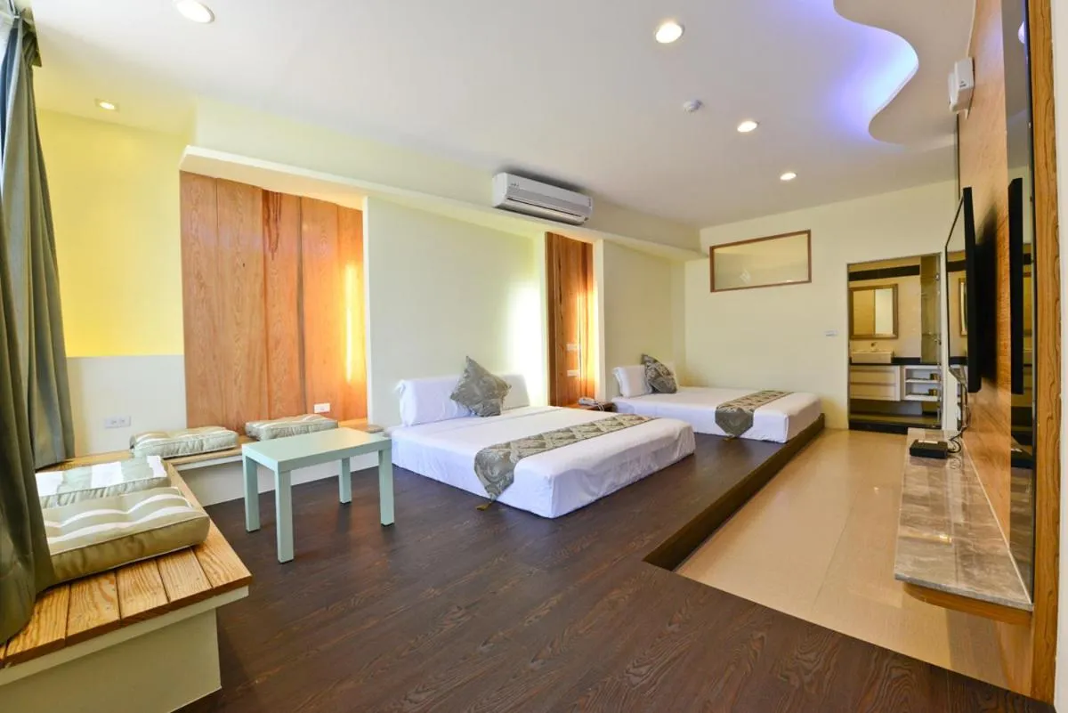 Bed in Oceanic Pearl Resort