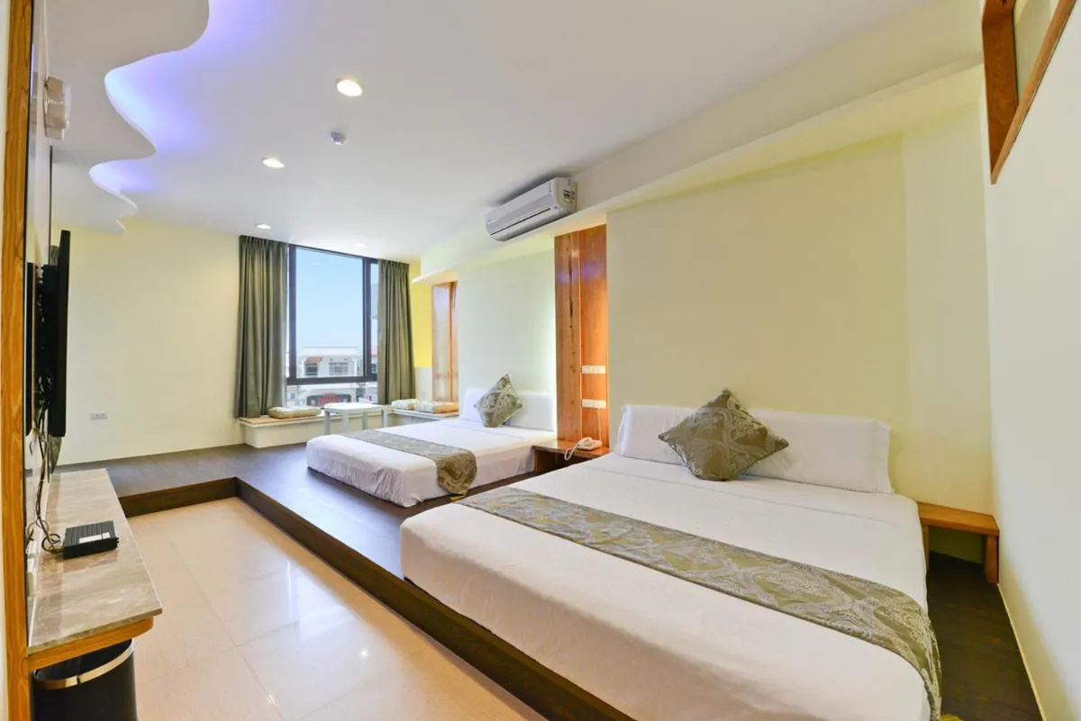 Bed in Oceanic Pearl Resort