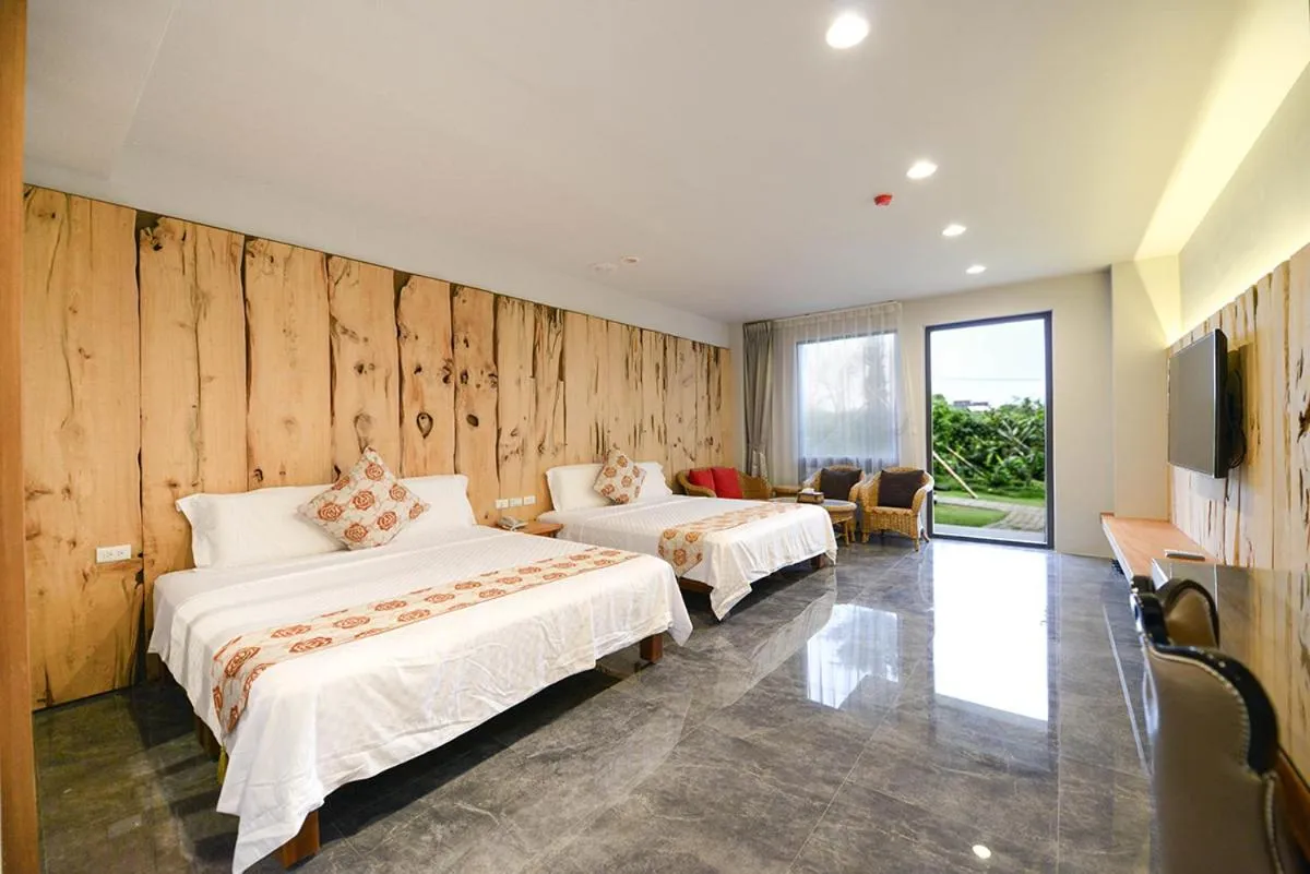 Bed in Oceanic Pearl Resort