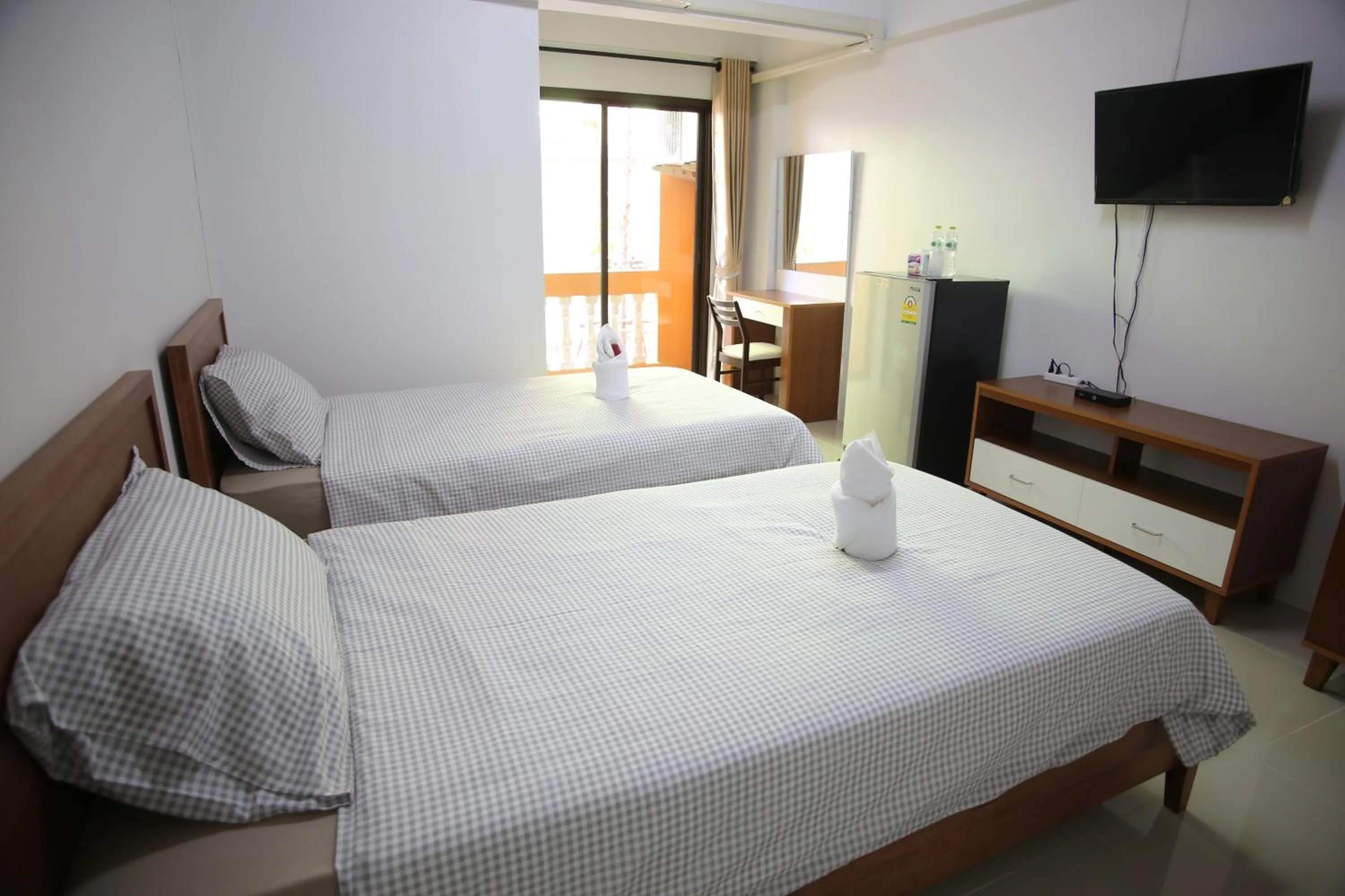 Bed in I-Home Residence and Hotel