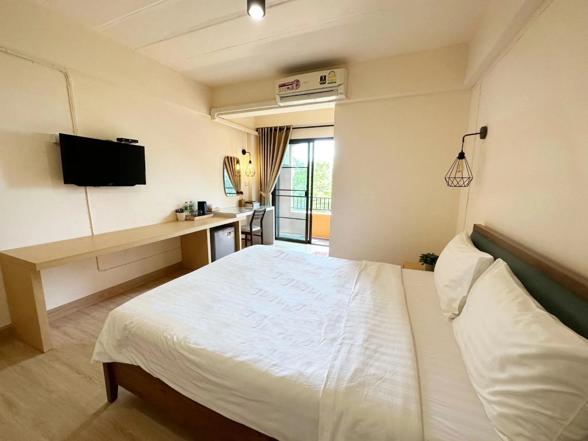 Bed in I-Home Residence and Hotel