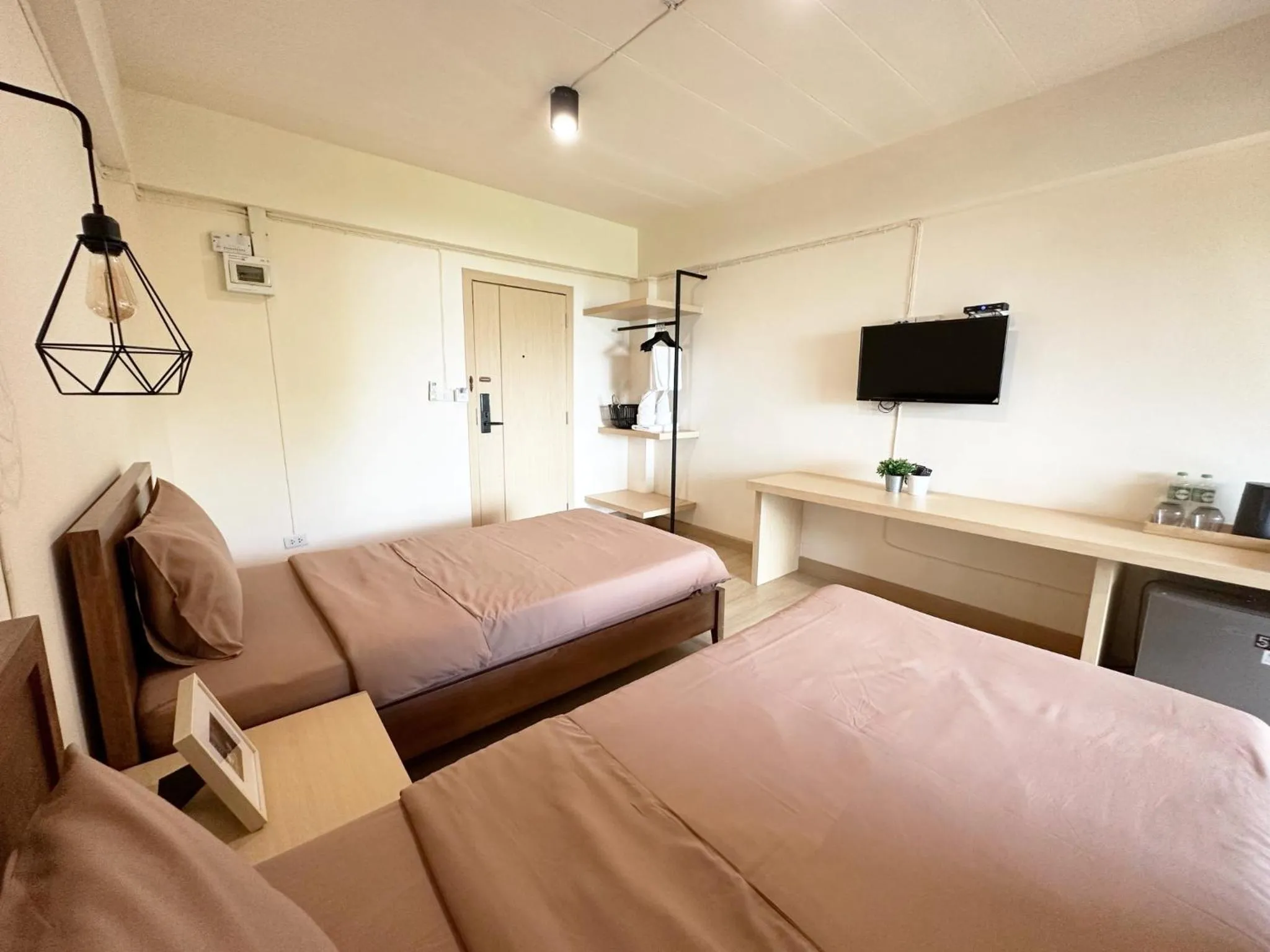 Bed in I-Home Residence and Hotel