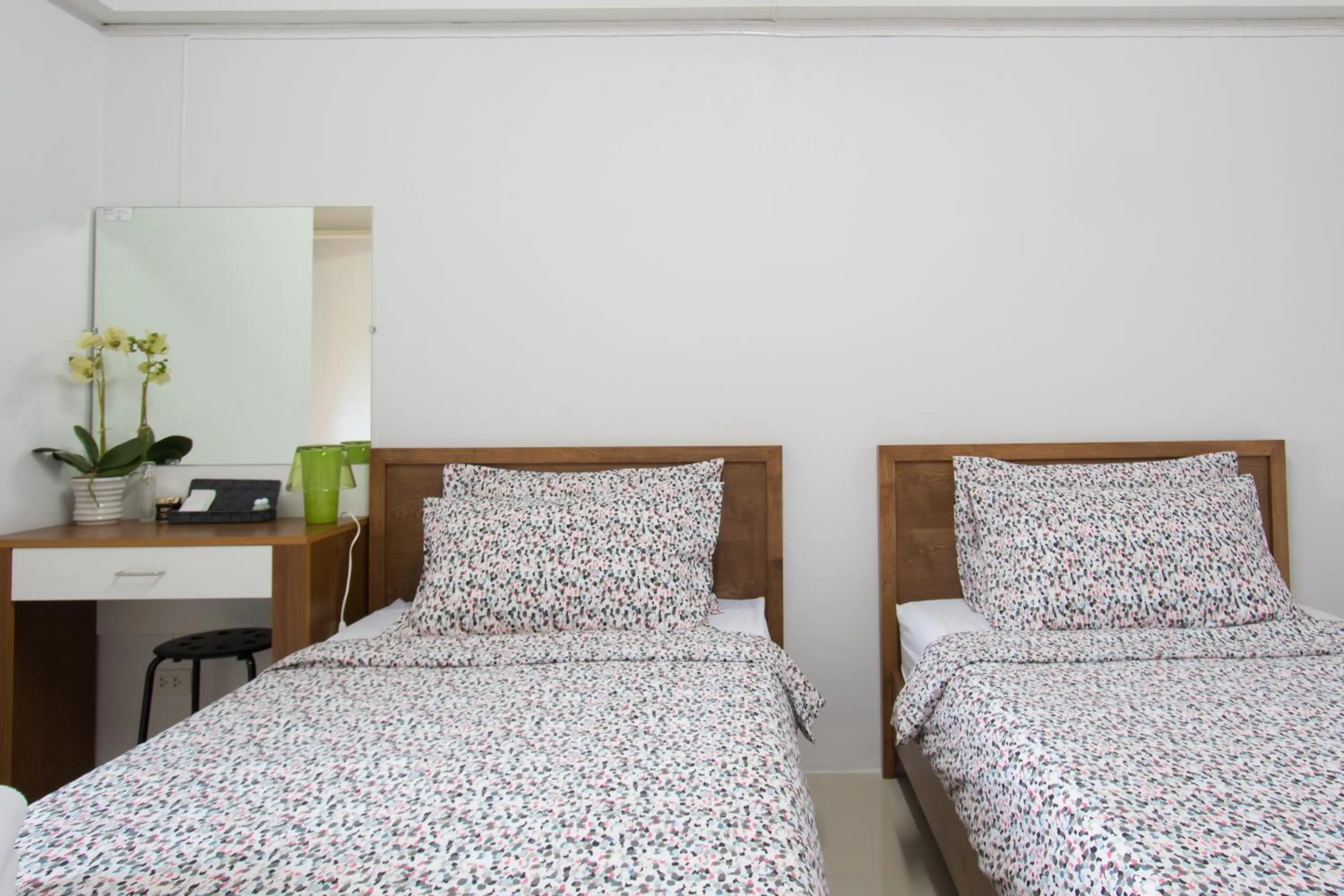 Bed in I-Home Residence and Hotel