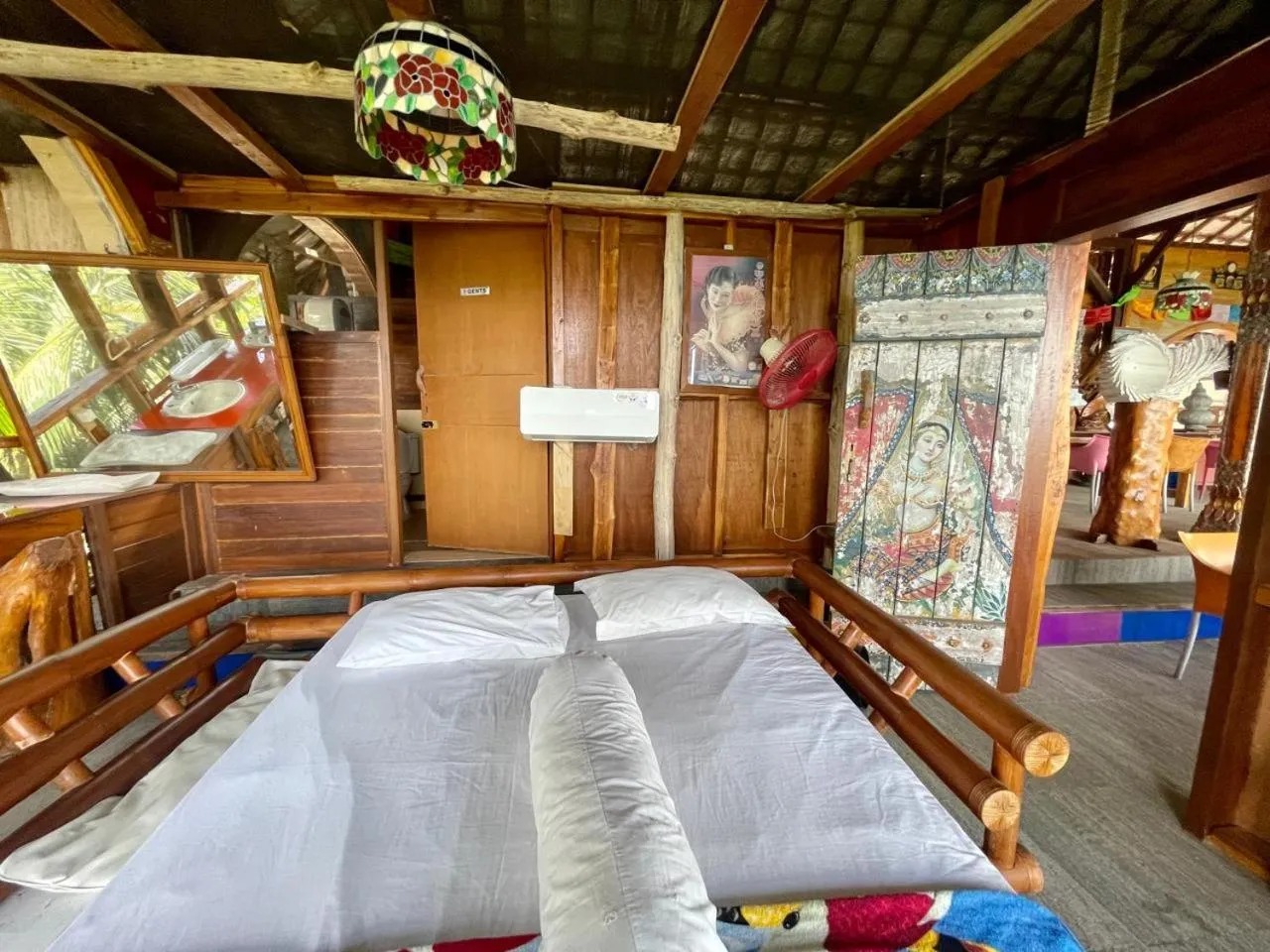 Bed in Karang Aji Beach Villa