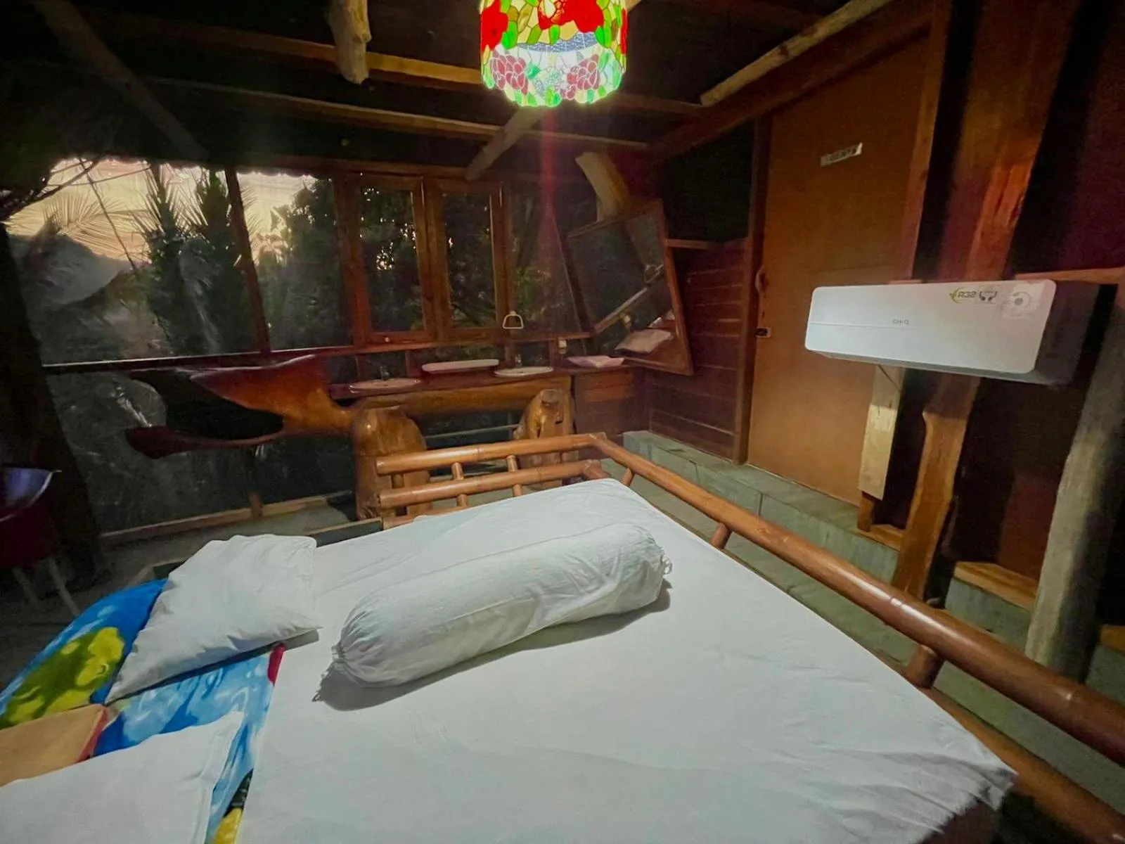 Bed in Karang Aji Beach Villa