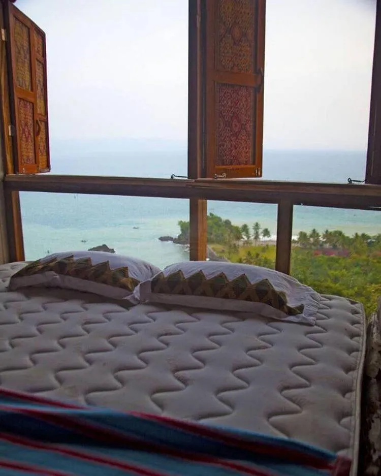 Bed in Karang Aji Beach Villa