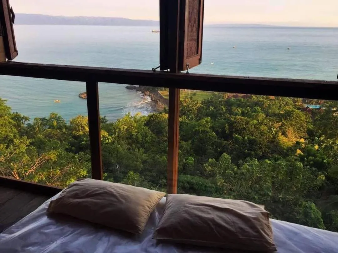 Bed in Karang Aji Beach Villa