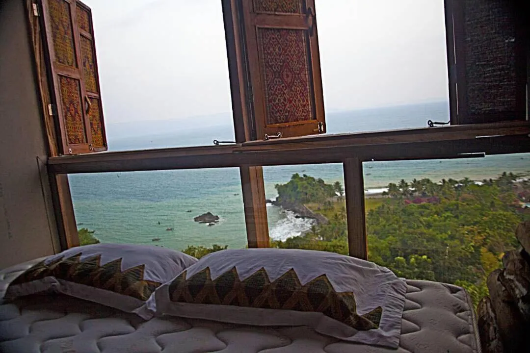 Bed in Karang Aji Beach Villa