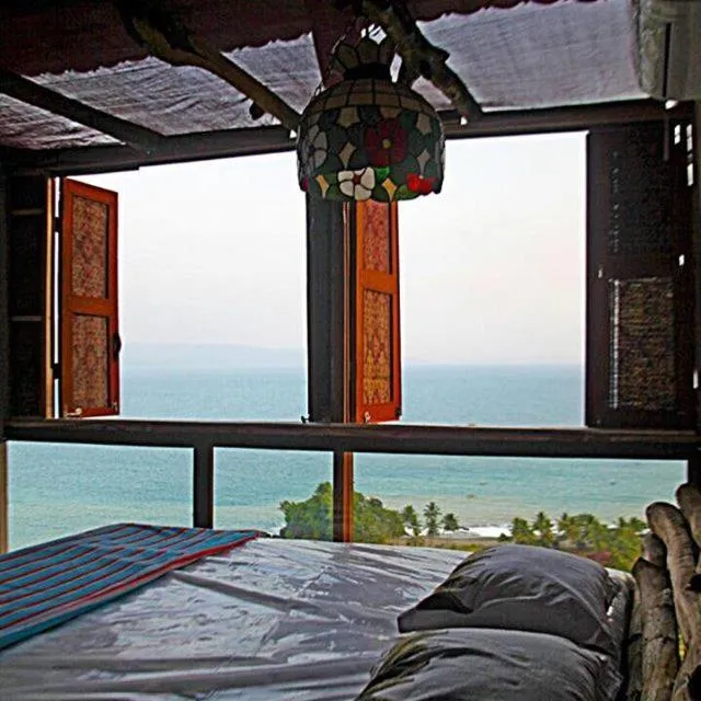 Bed in Karang Aji Beach Villa
