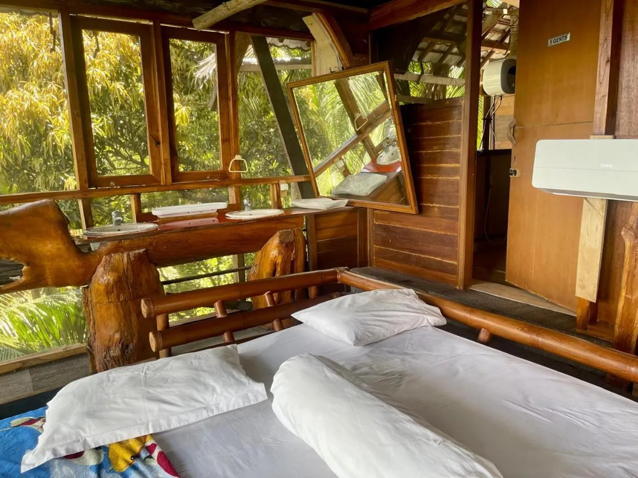 Bed in Karang Aji Beach Villa