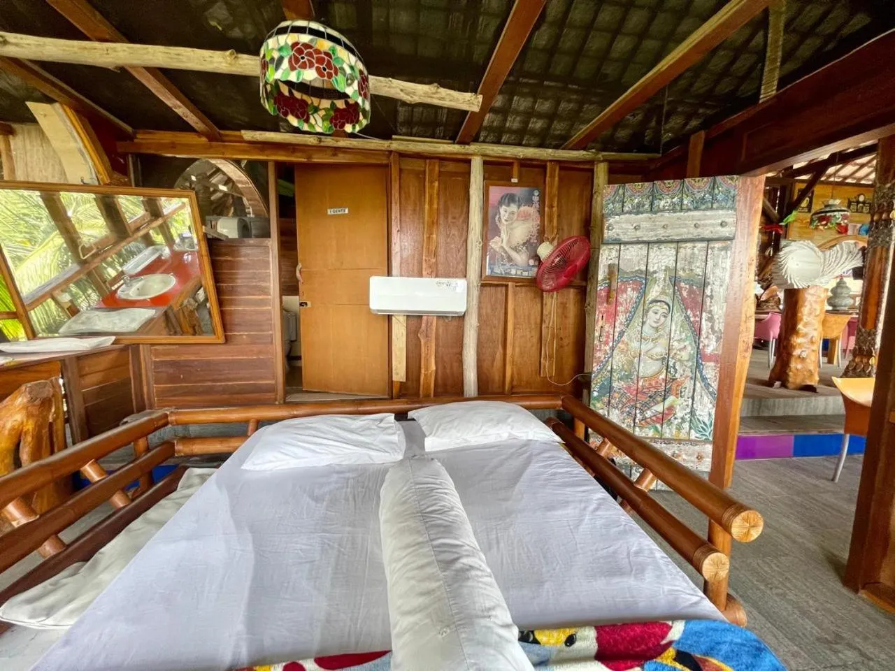 Bed in Karang Aji Beach Villa