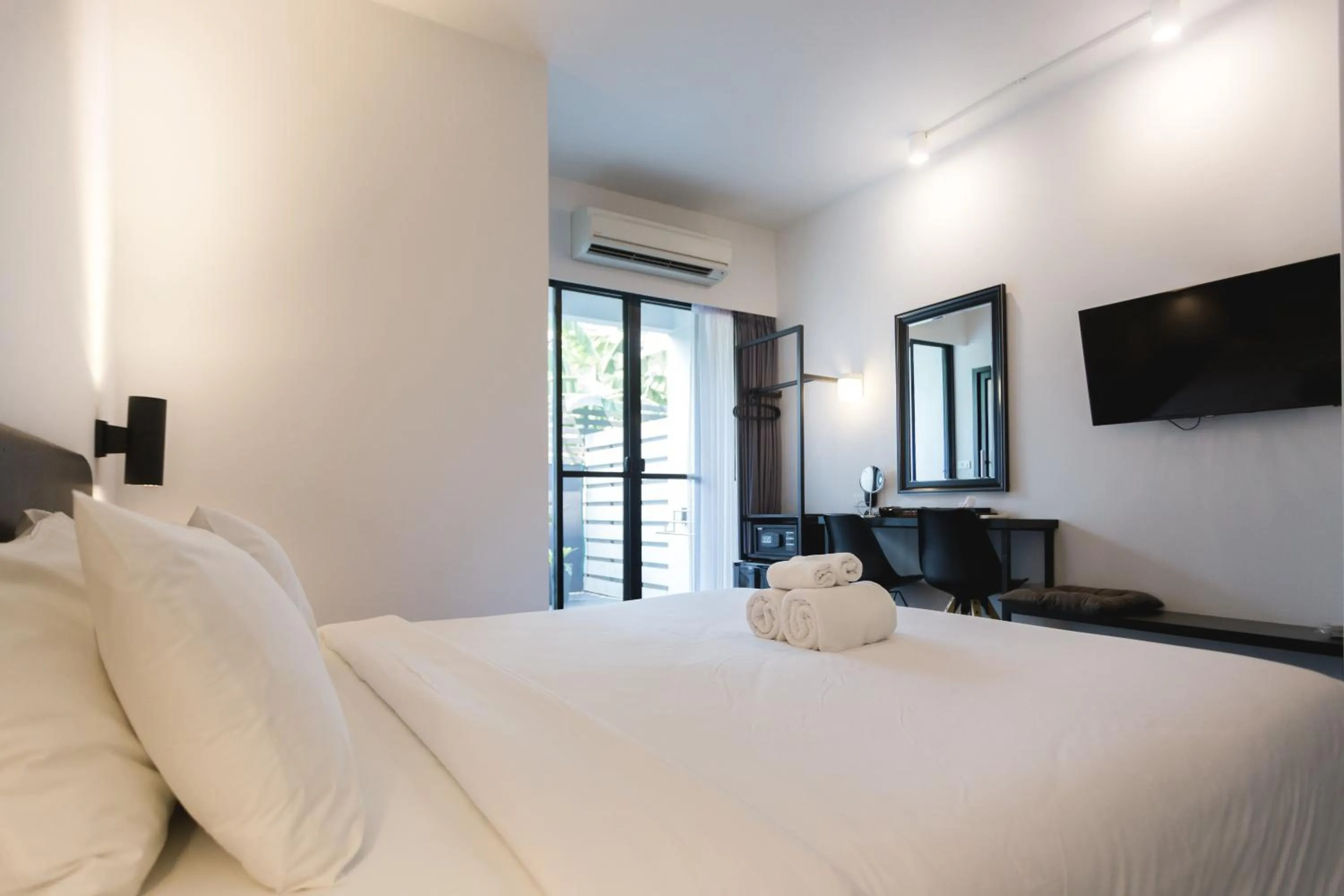 Bed in iWualai Hotel