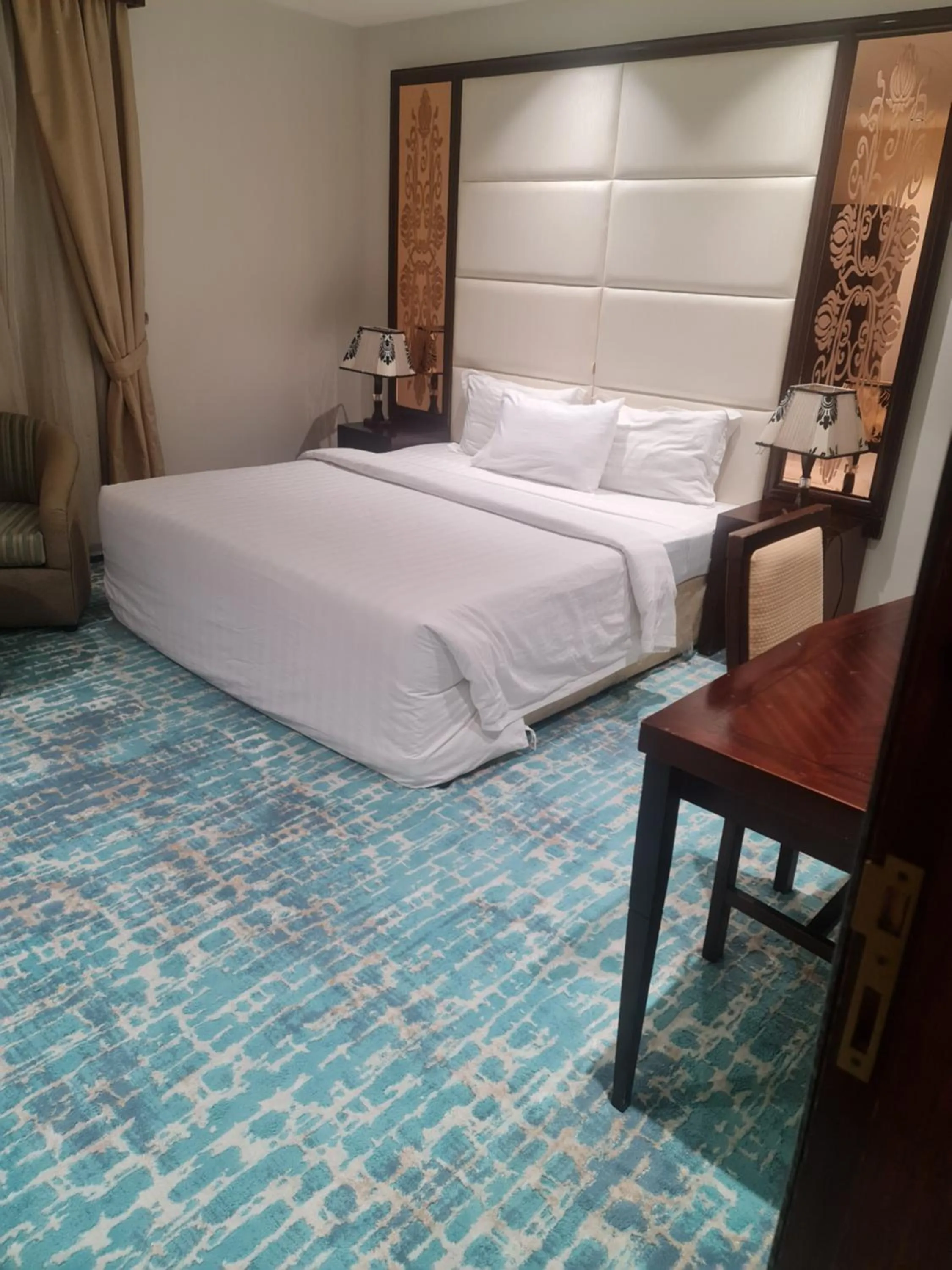 Bed in Makarim Palm Hotel