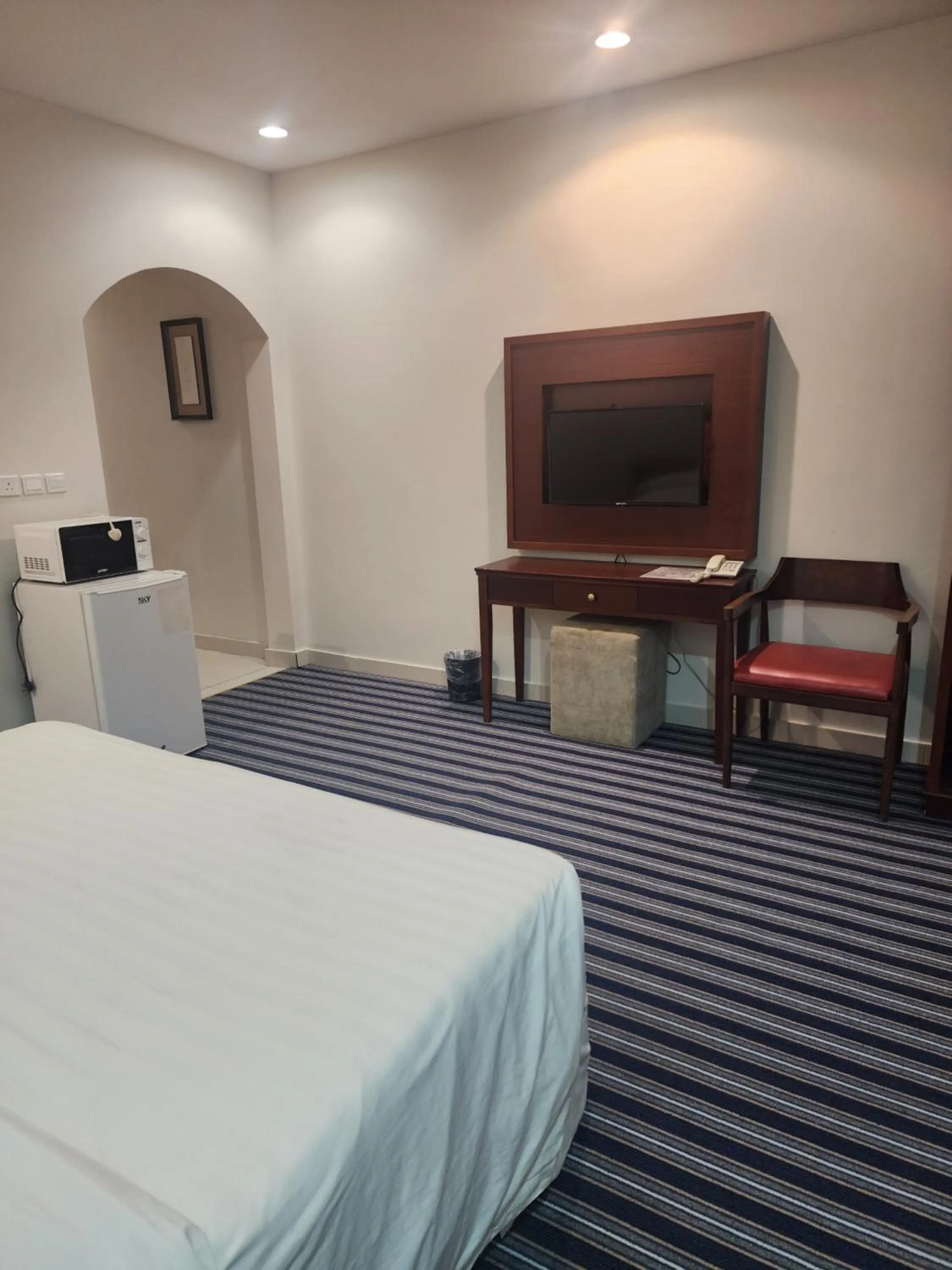 Bed in Makarim Palm Hotel