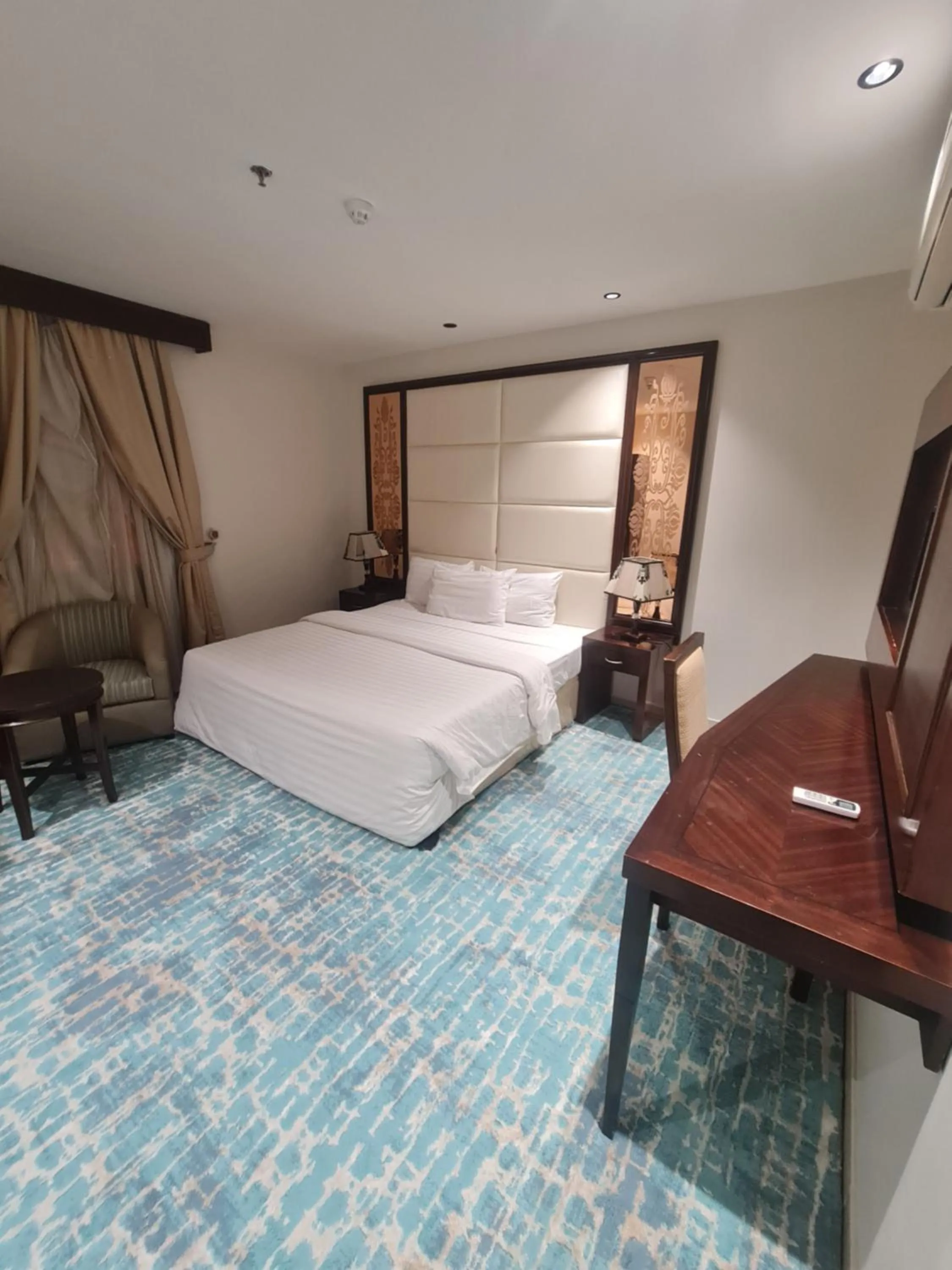 Bed in Makarim Palm Hotel