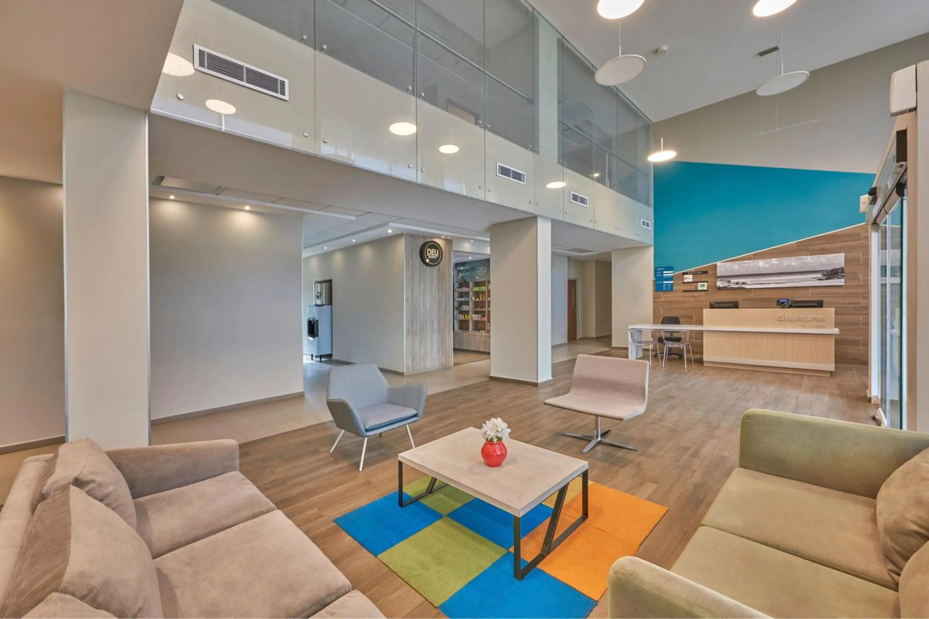 Lobby or reception in City Express Suites by Marriott Playa del Carmen