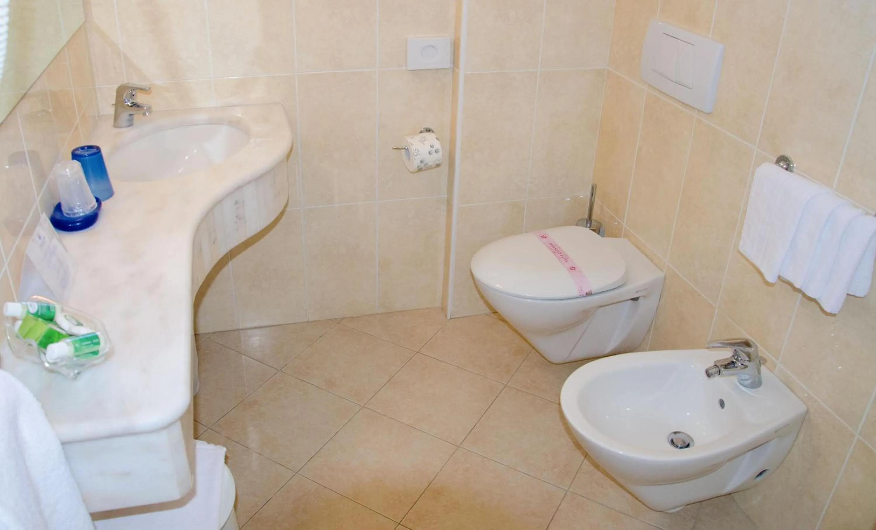 Toilet in Almaluna Hotel & Resort