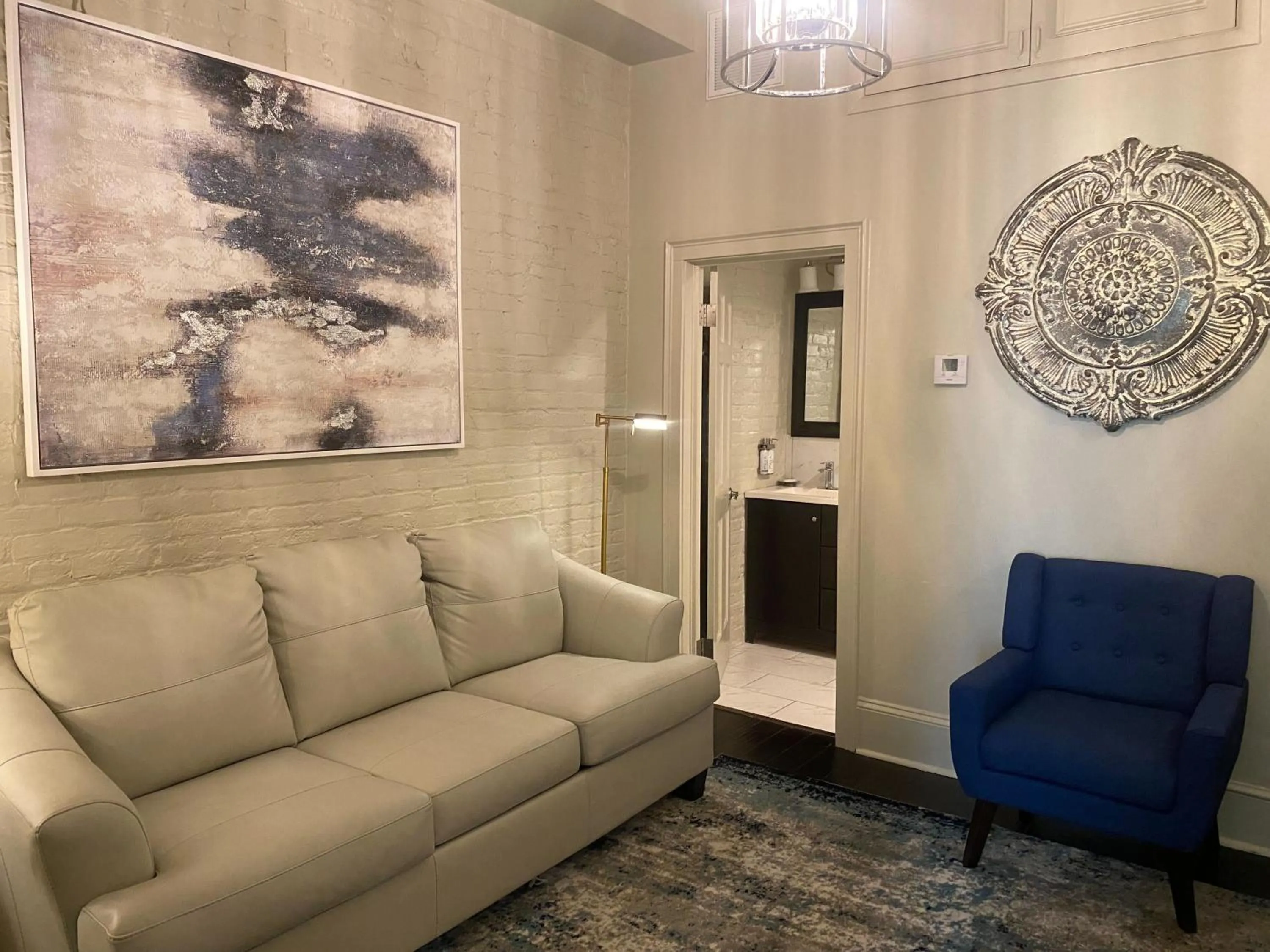 Seating area in La Galerie French Quarter Hotel