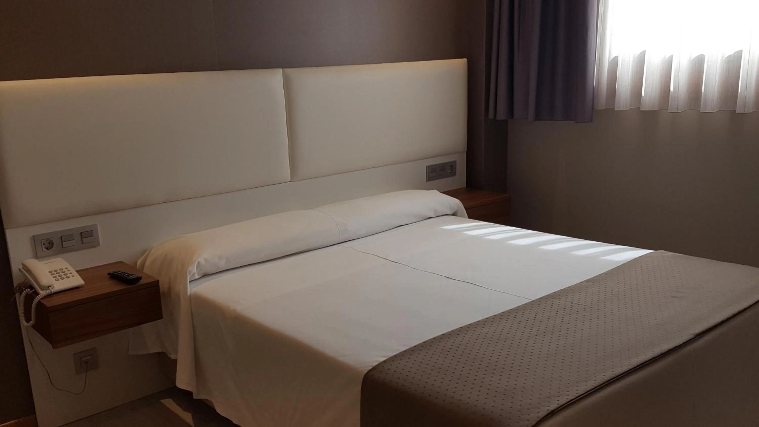 Bed in Hotel la Posada de Roces