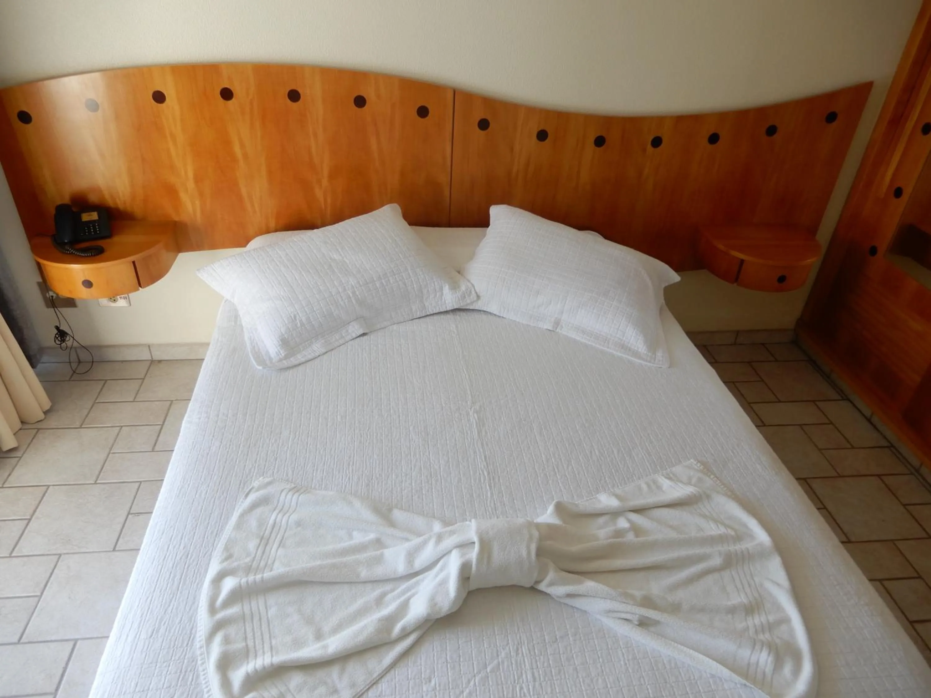 Bed in Hotel Aojesp