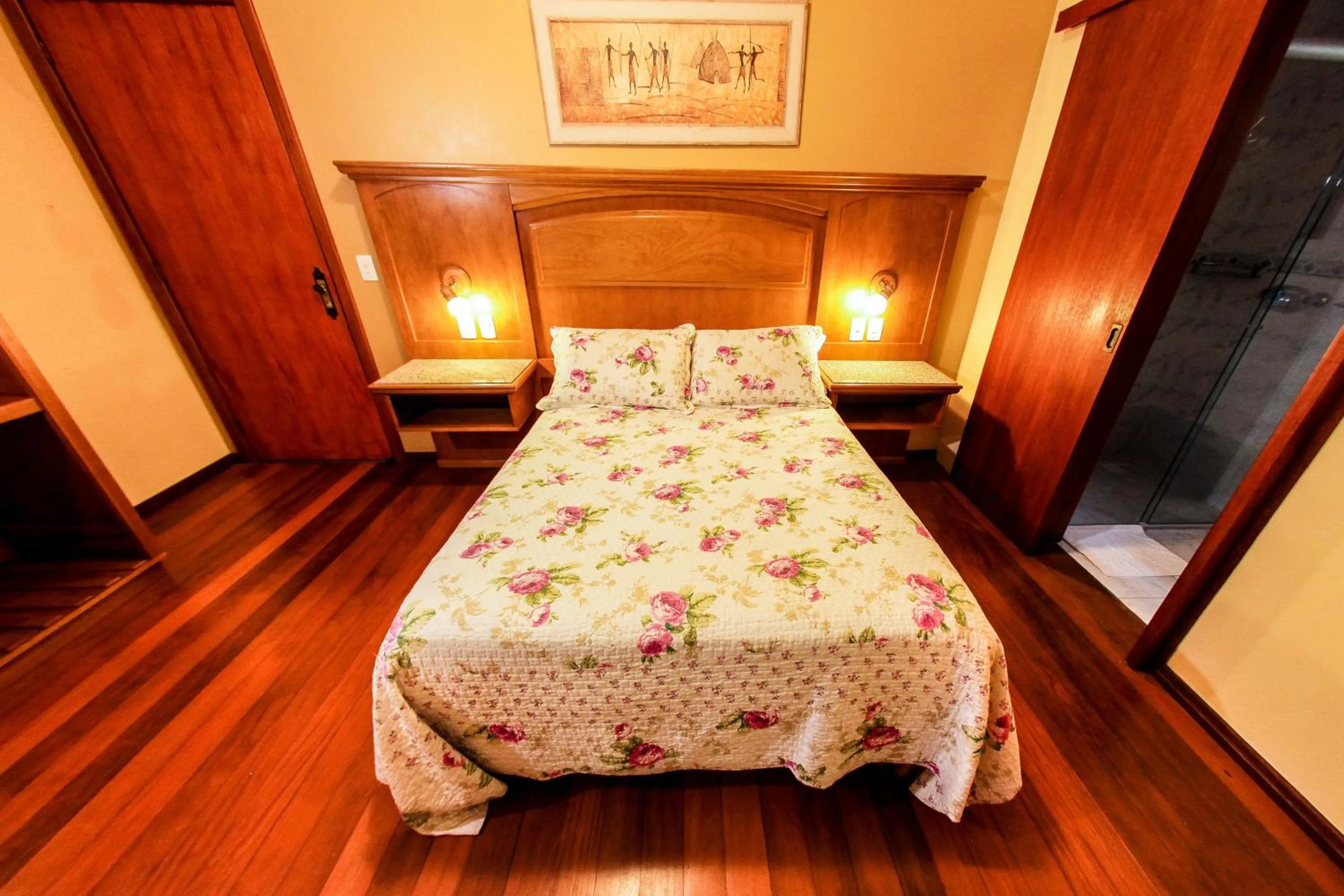 Bed in Pousada Das Papoulas