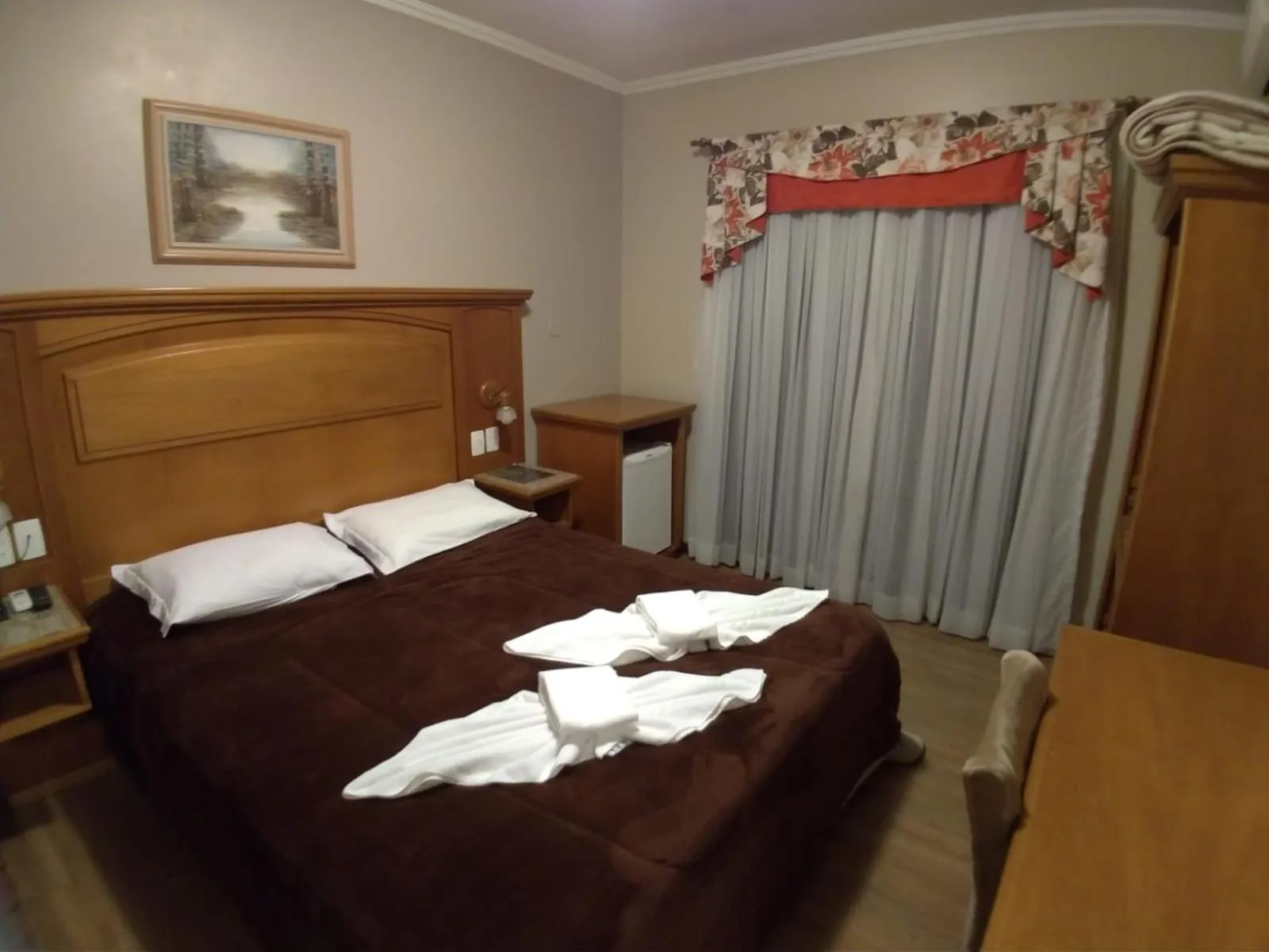 Bed in Pousada Das Papoulas