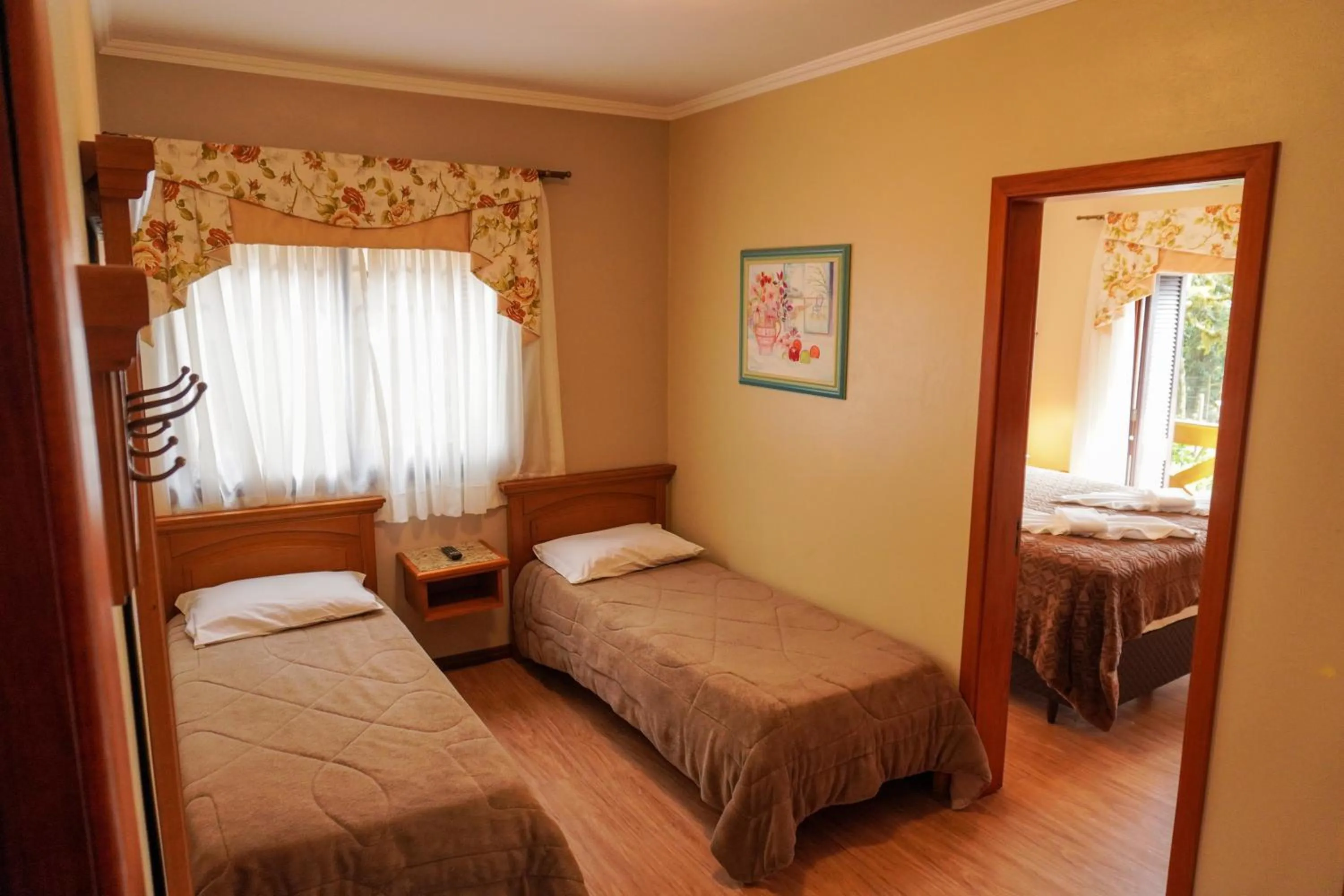 Bed in Pousada Das Papoulas