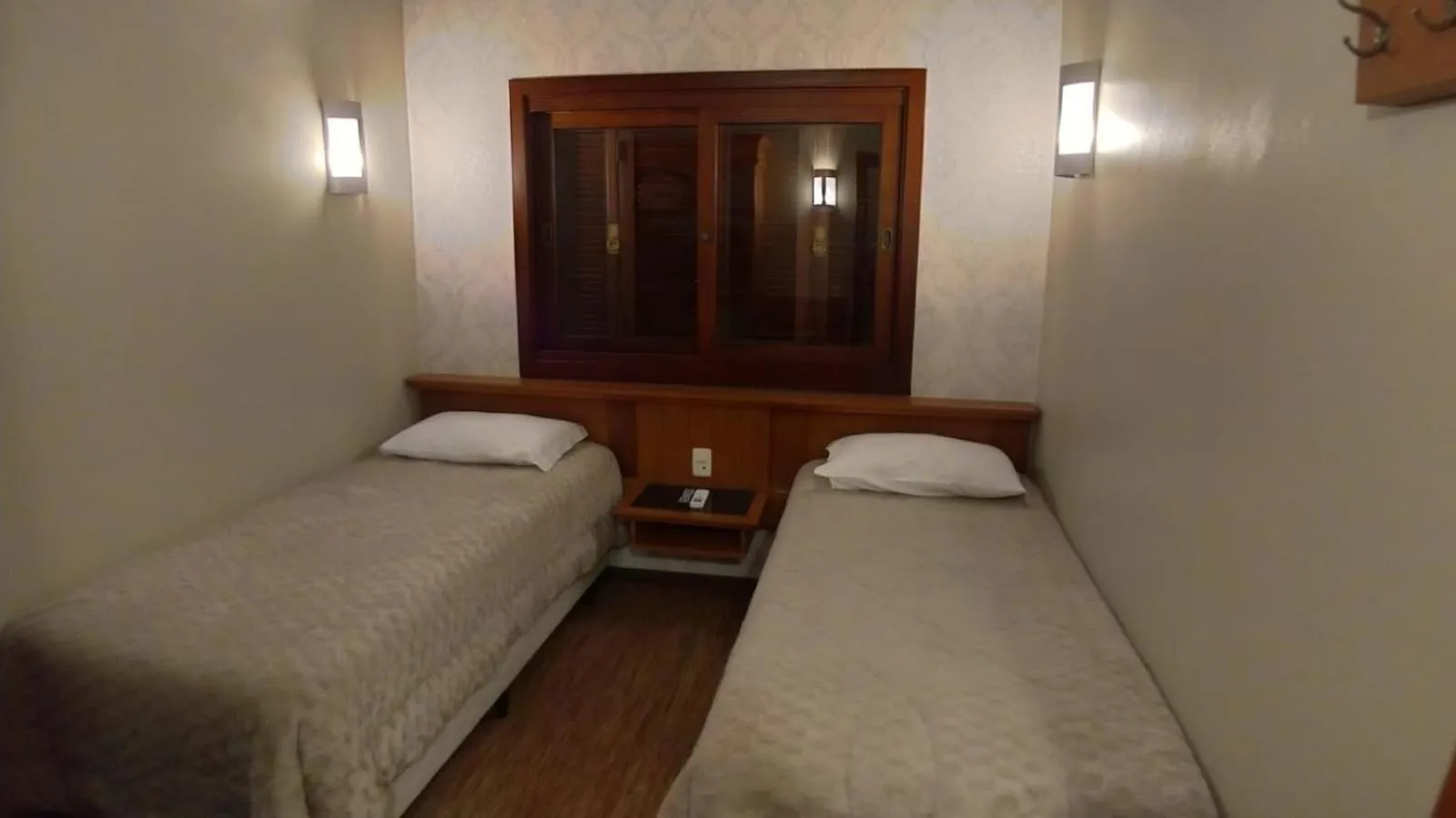 Bed in Pousada Das Papoulas