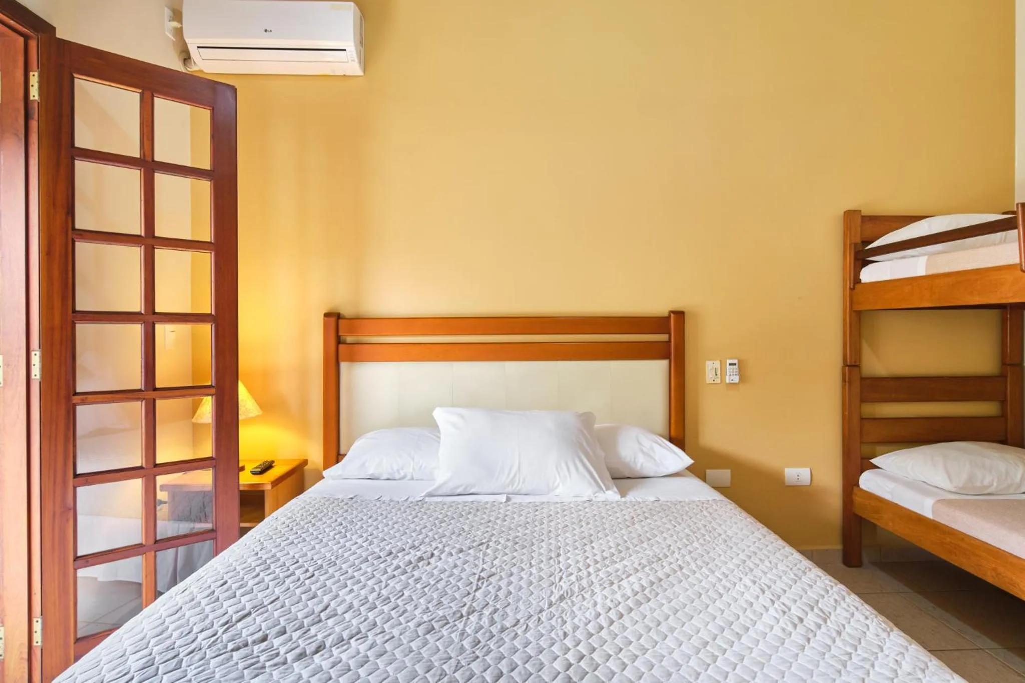 Bed in Pousada Recanto Montecarlo