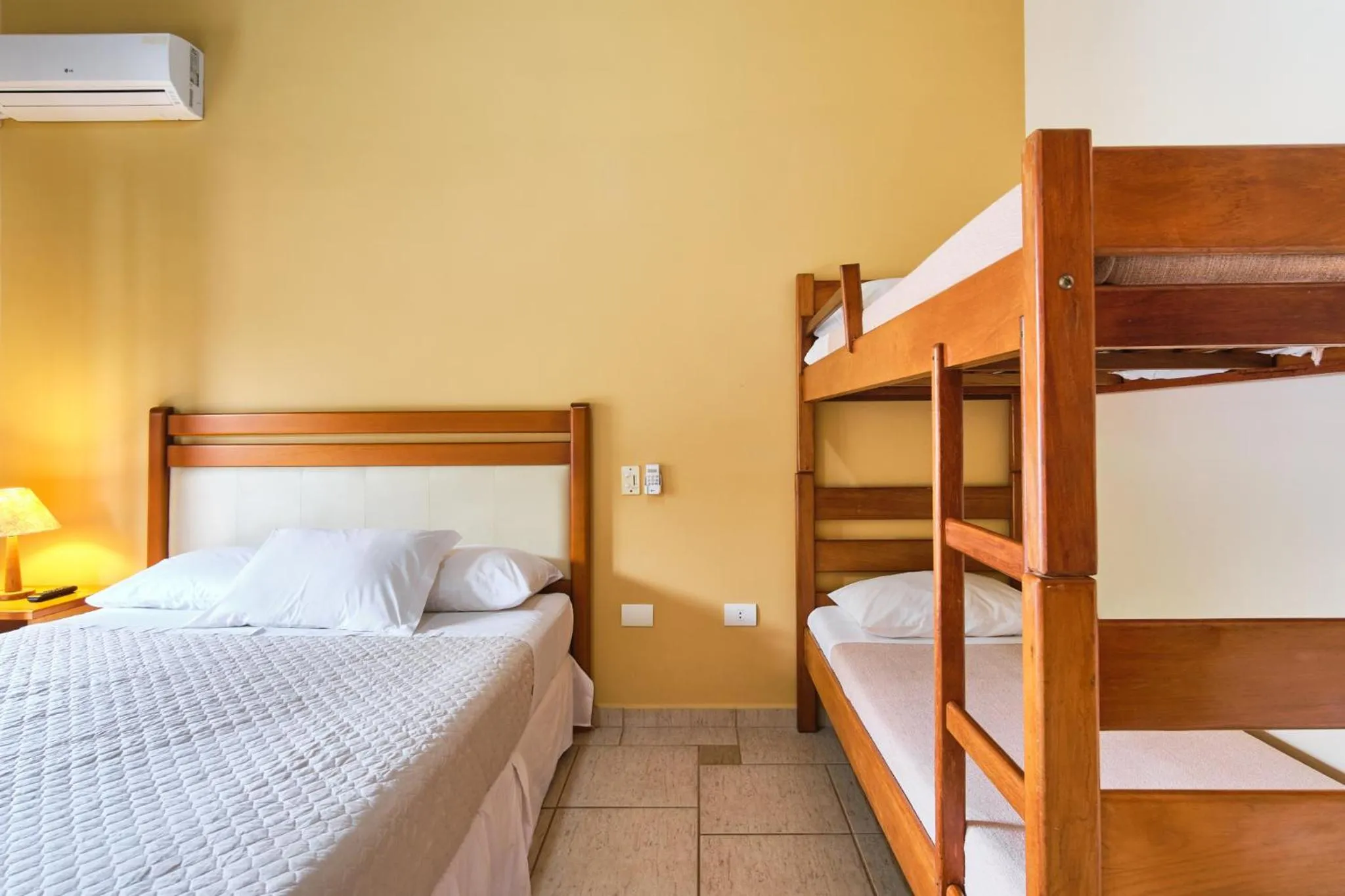 Bed in Pousada Recanto Montecarlo