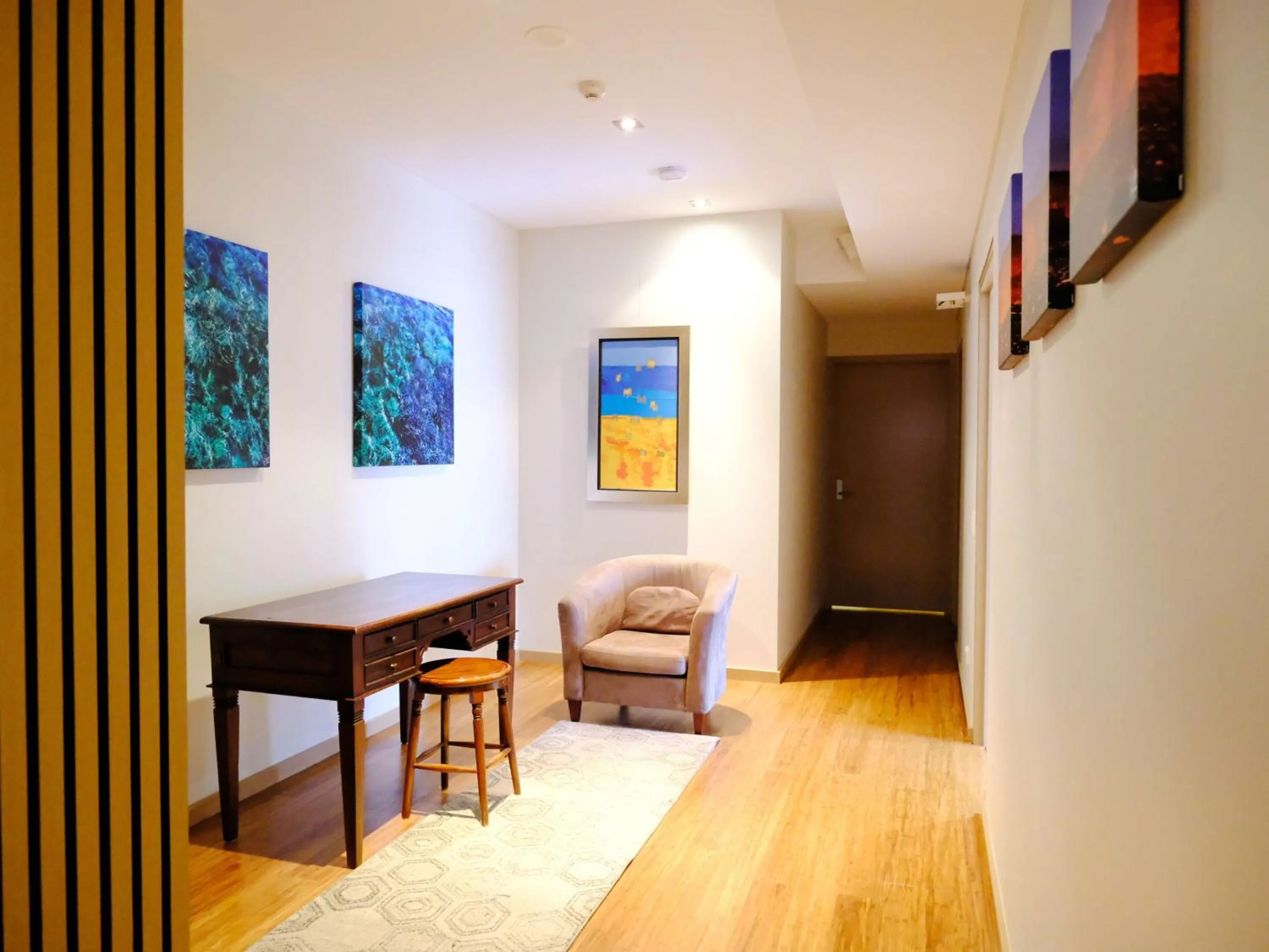 Seating area, Bed in Gallery Serviced Apartments