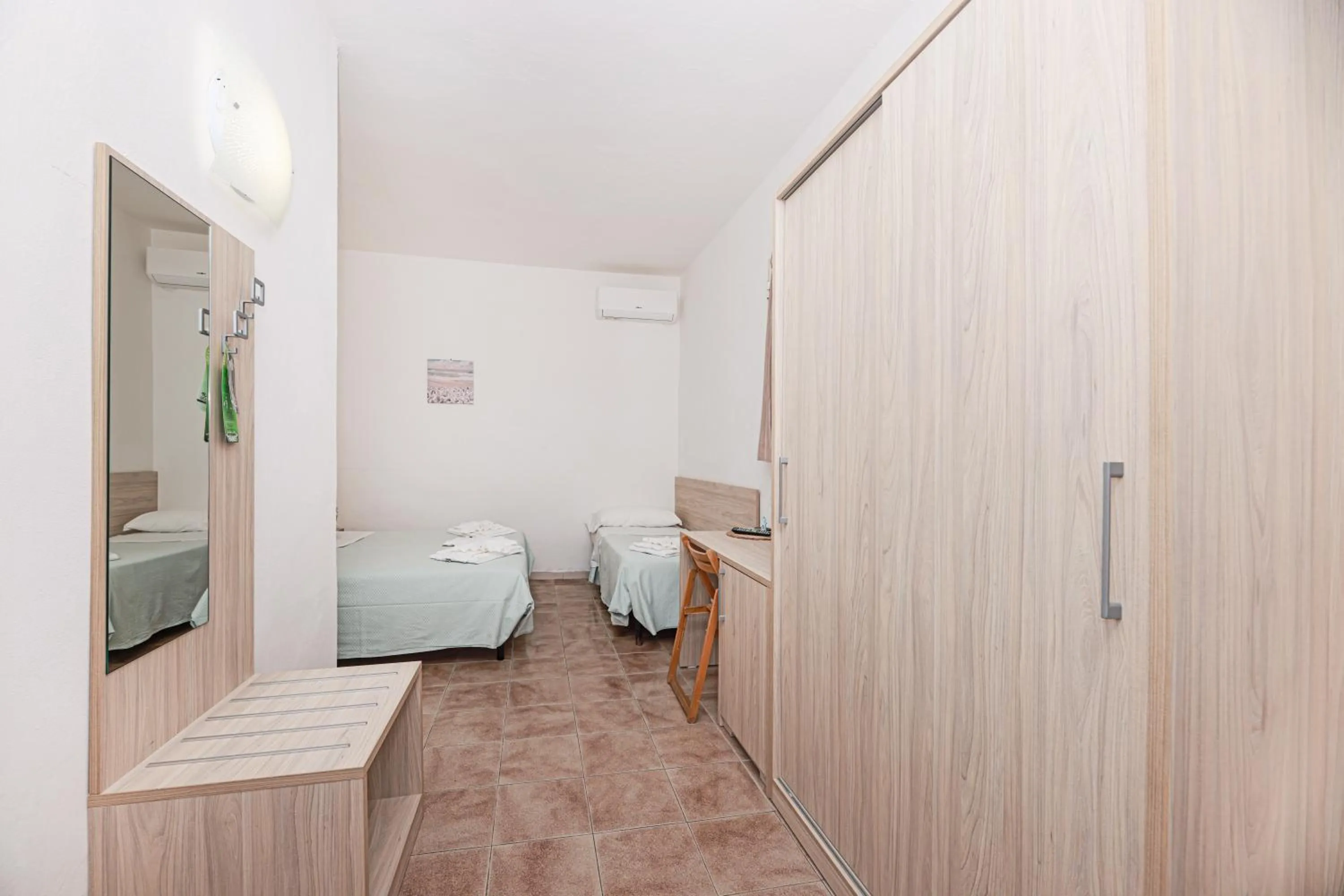 Bed in Hotel Le Ghiaie