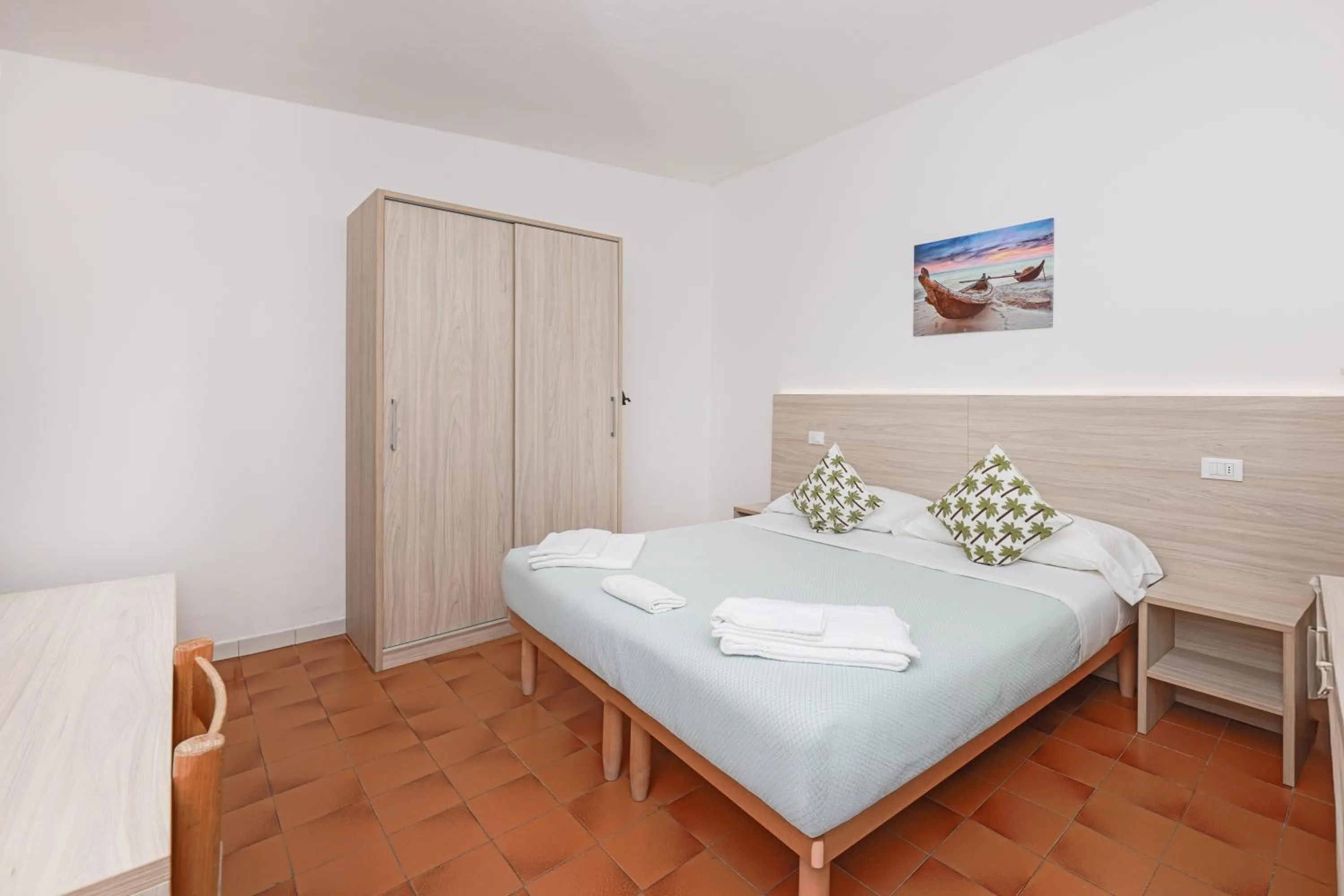 Bed in Hotel Le Ghiaie