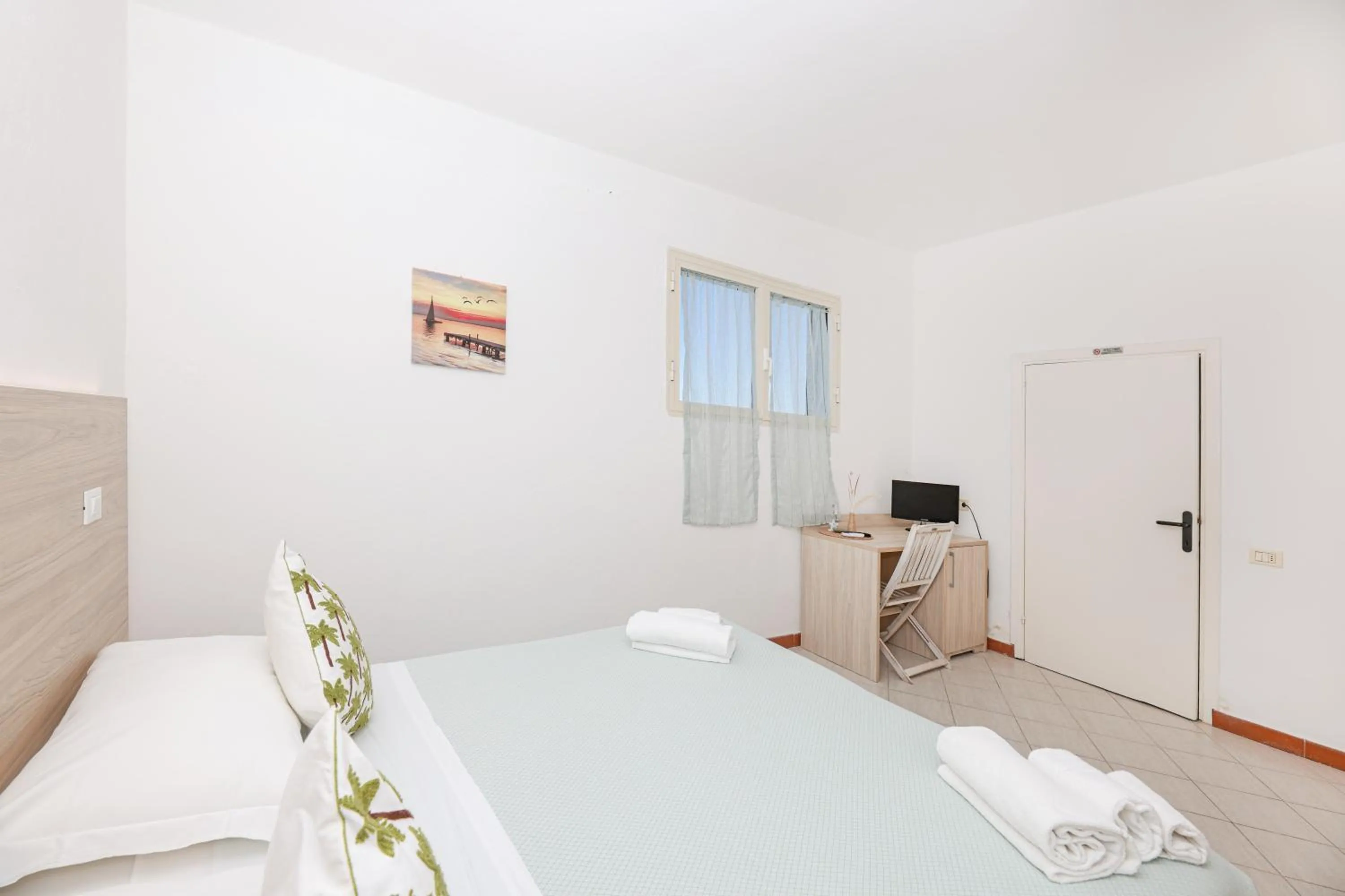 Bed in Hotel Le Ghiaie